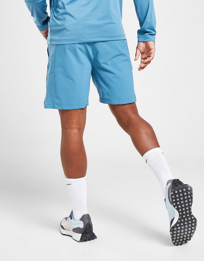 Krótkie spodenki, szorty męskie NEW BALANCE SZORTY WOVEN SHORTS MS21600SGD Niebieski
