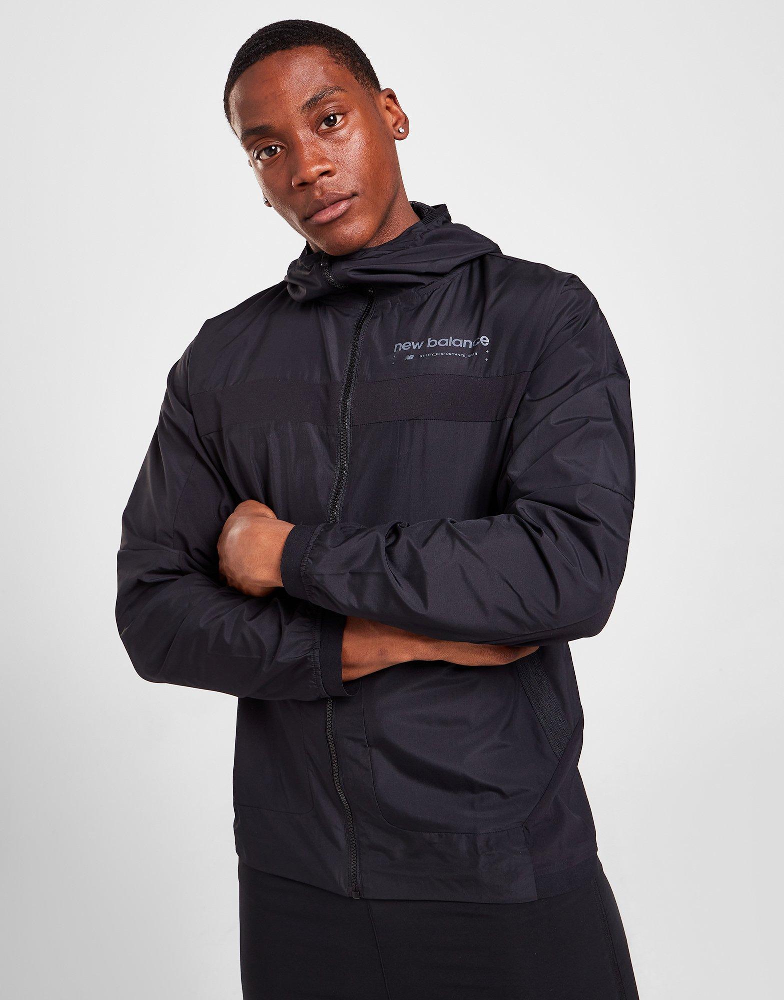 Kurtka męska NEW BALANCE PRZEJŚCIOWA TECH WOVEN JACKET MJ21044BK Czarny