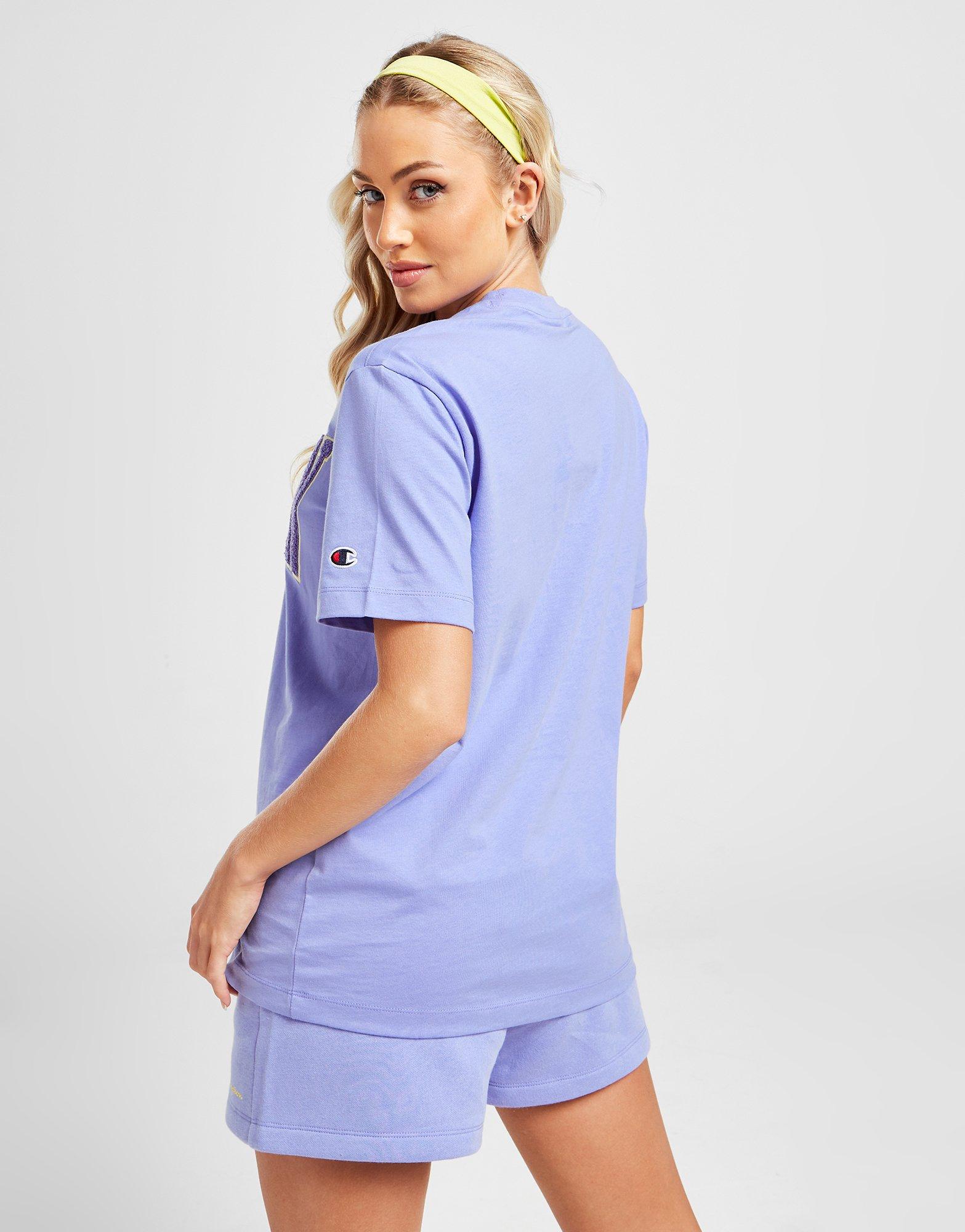 Dámske tričko CHAMPION TRIČKO VARSITY TRIČKO 116214JKABS158 Modrá