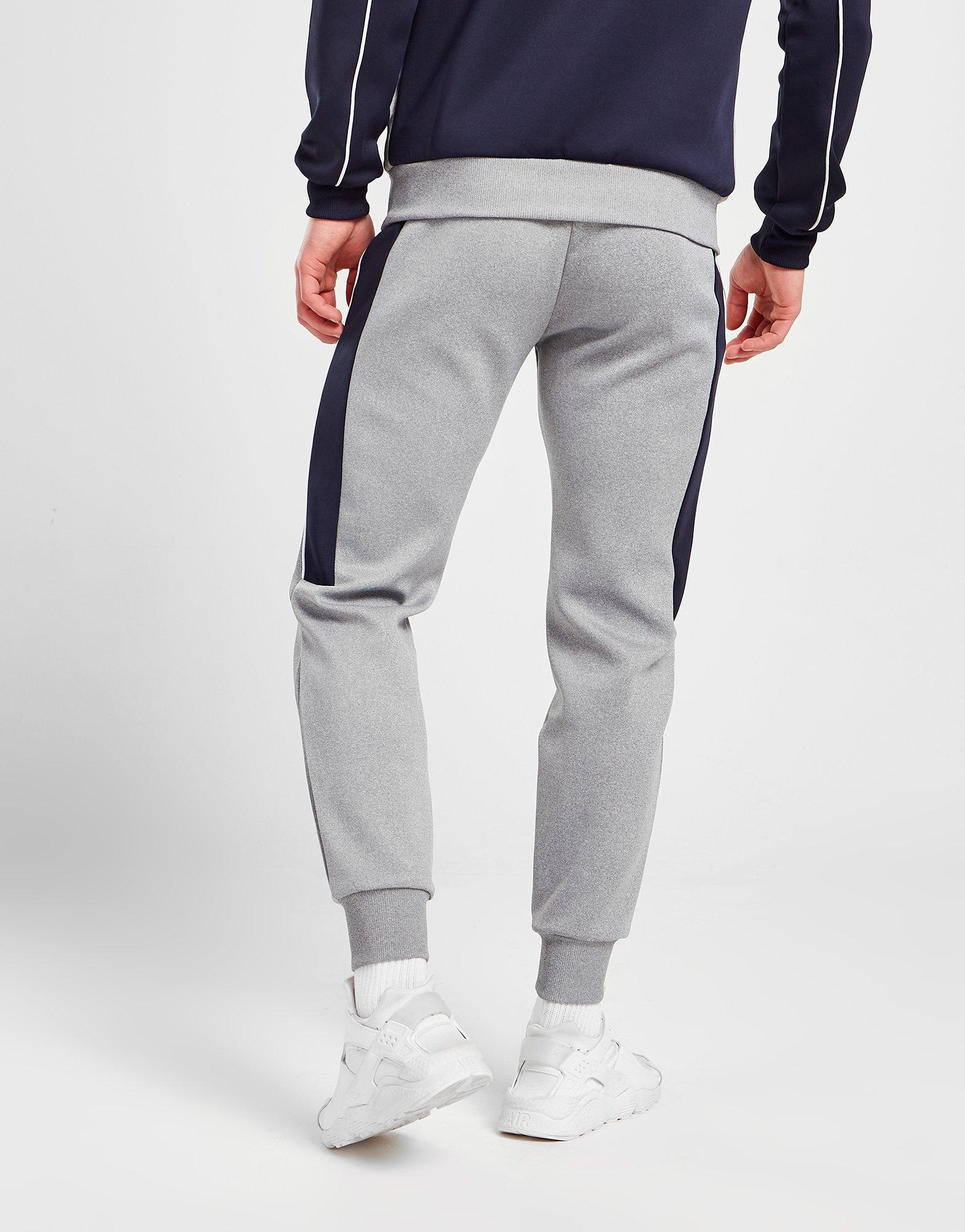 Pánske nohavice MCKENZIE HASTE POLY TRACK PANTS MCKTM15181 Tmavomodrá