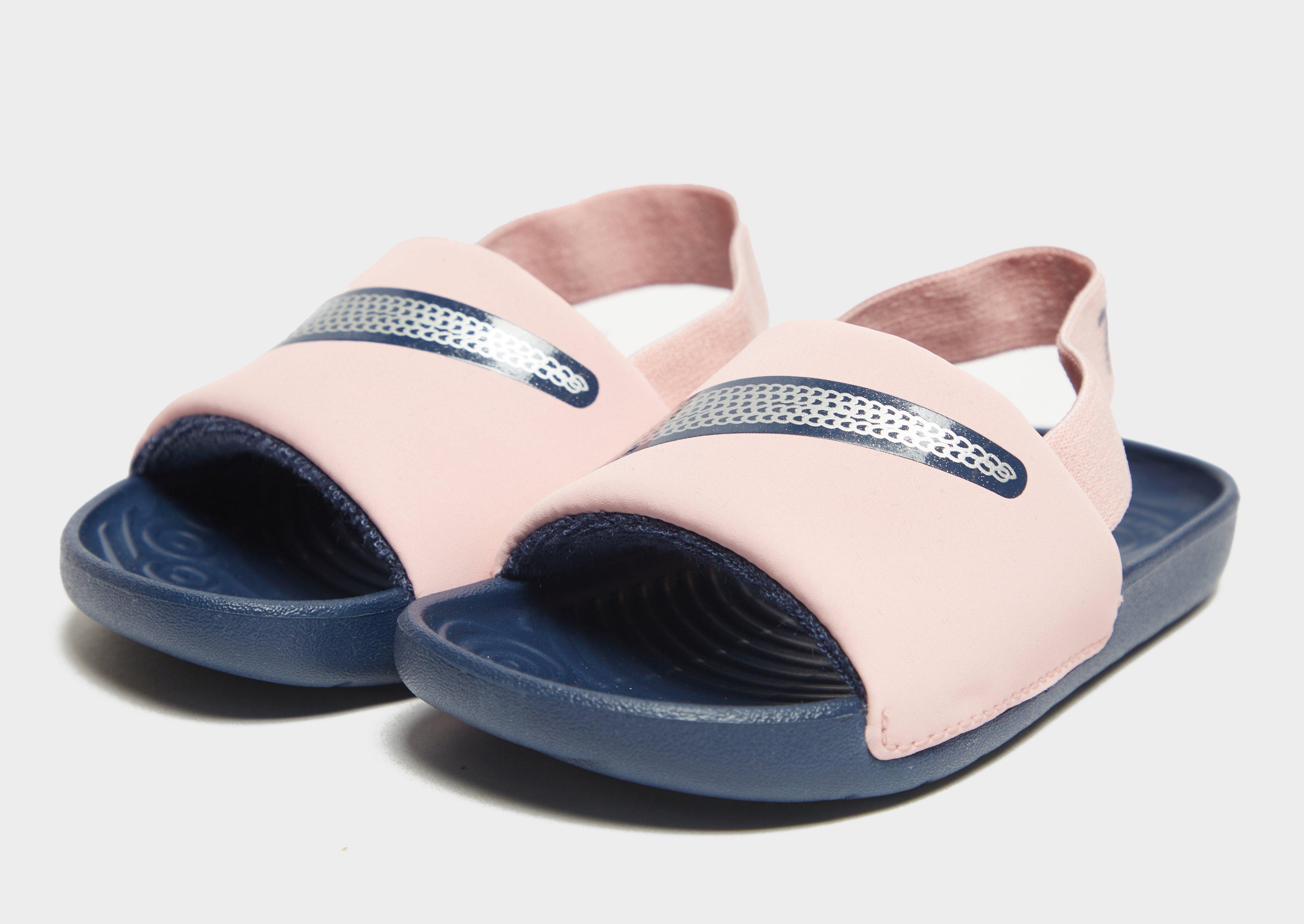Gyerek papucsok és flip-flopok NIKE KAWA SLIDES  DB3297-600 Rózsaszín