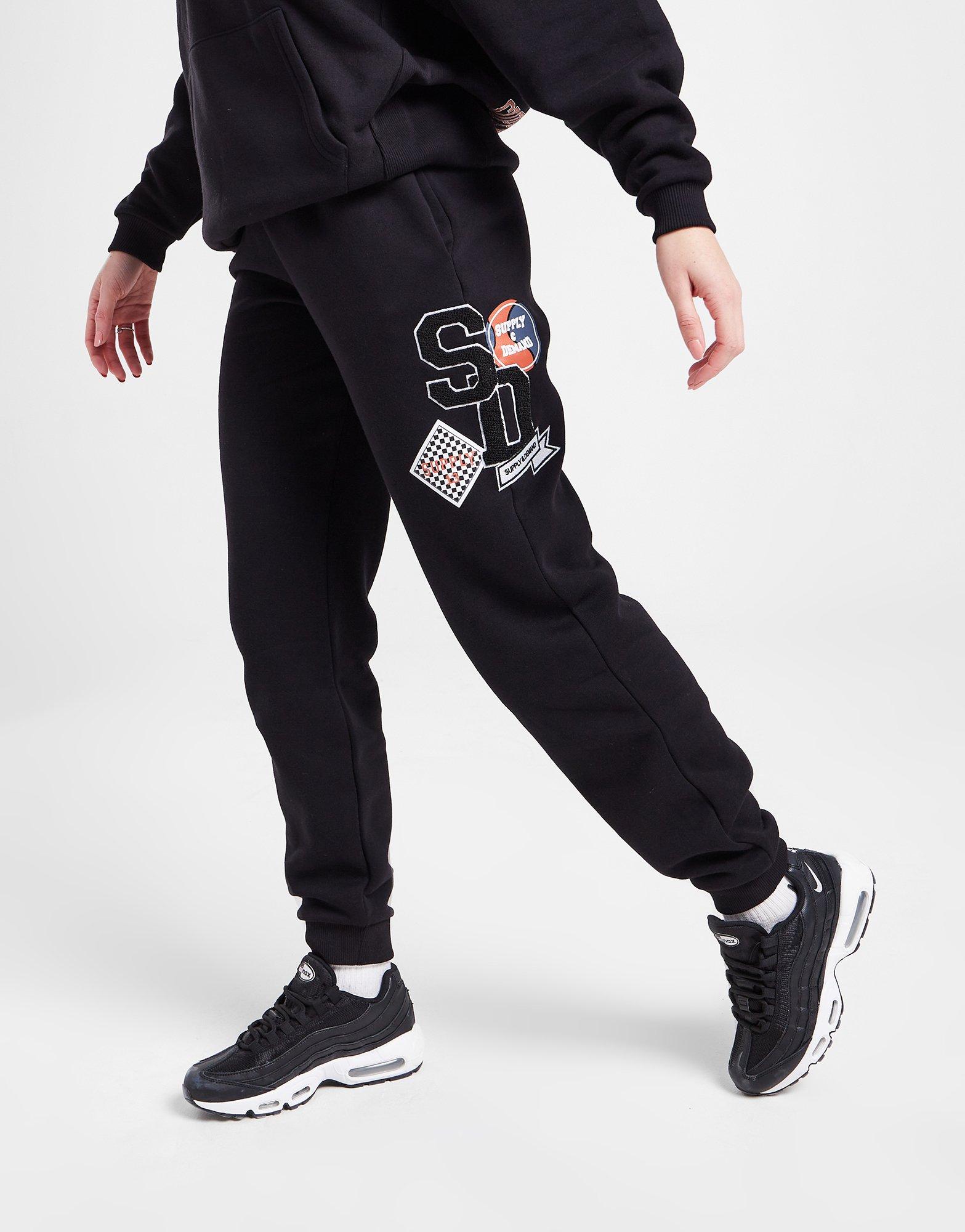 Dámske nohavice SUPPLY & DEMAND NOHAVICE  LOGO BADGE JOGGERS SUPTW16023BLK Čierna