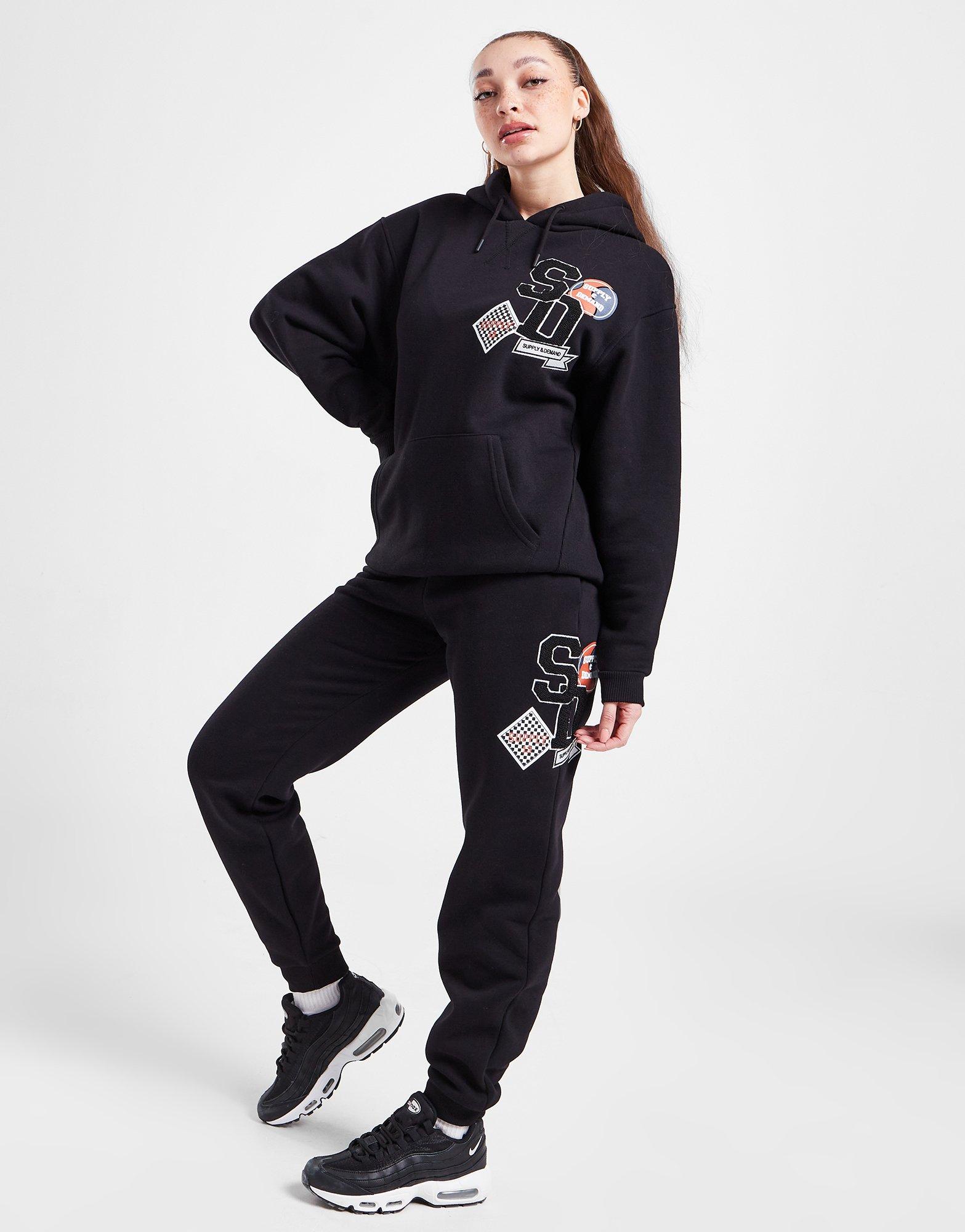 Dámske nohavice SUPPLY & DEMAND NOHAVICE  LOGO BADGE JOGGERS SUPTW16023BLK Čierna