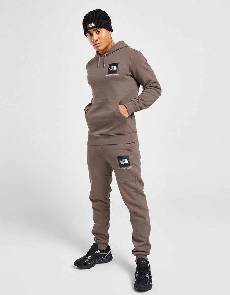 Pantaloni pentru bărbați THE NORTH FACE PANTALONI DE   TRENING  FINE BOX JOGGERS  NF0A5IILNXL1 Maro