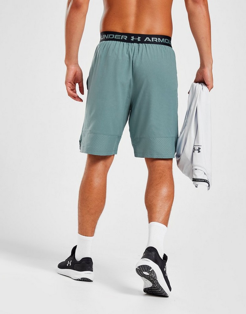 Krótkie spodenki, szorty męskie UNDER ARMOUR SZORTY VANISH WOVEN SHORTS 1370382-177 Zielony