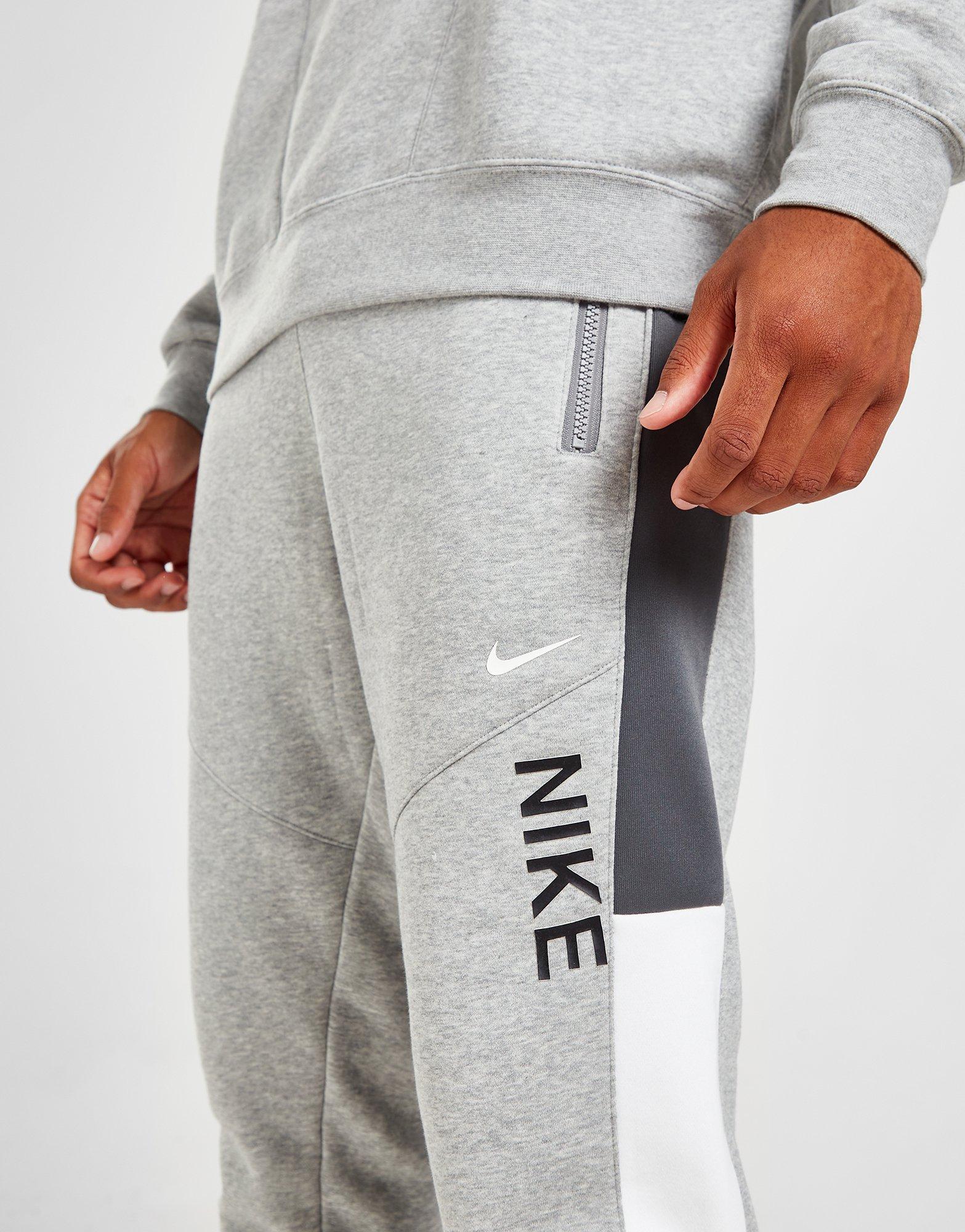 Pánske nohavice NIKE NOHAVICE  HYBRID FLC PANT DGH/WHT DV2330-063 Sivá