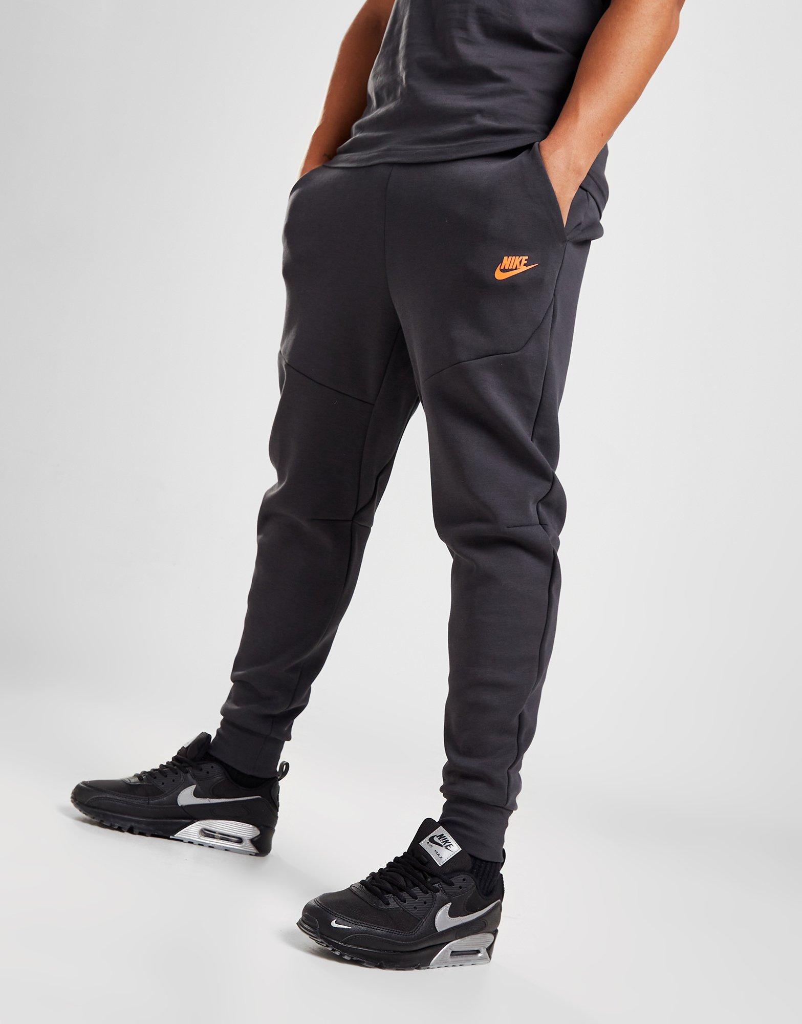 Pánske nohavice NIKE NOHAVICE  TECH FLEECE DV0538-070 Sivá