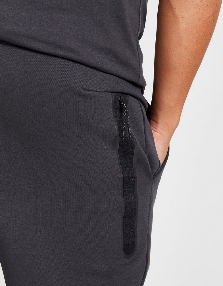 Pantaloni pentru bărbați NIKE PANTALONI  TECH FLEECE DV0538-070 Gri