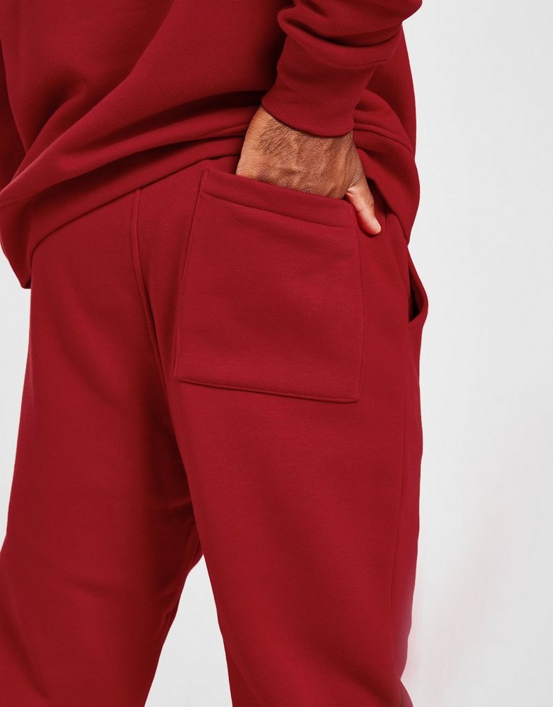 JORDAN SPODNIE JDAN ESS PT RED DQ7340-687 Czerwony