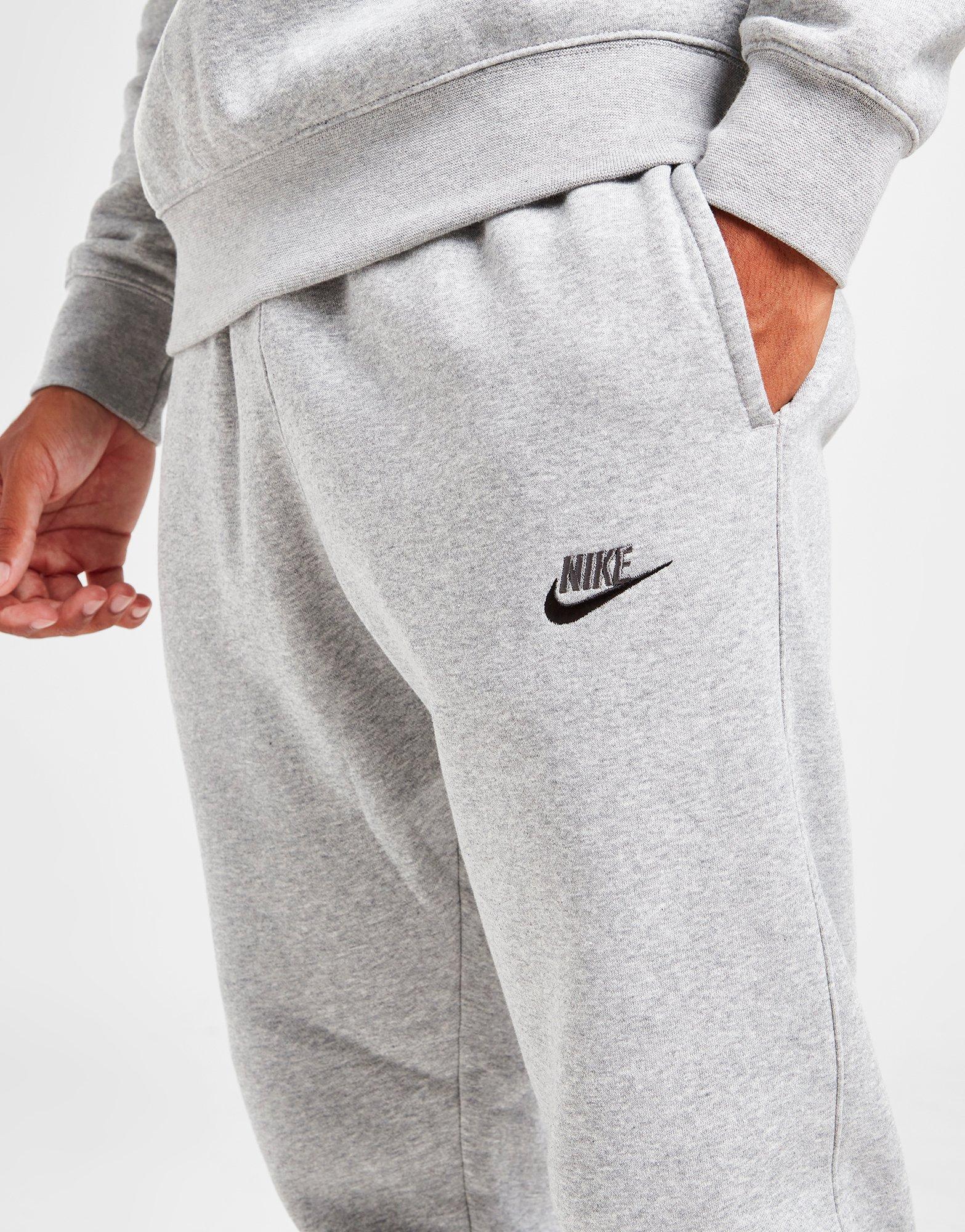 Pánske nohavice NIKE NOHAVICE  FDTN PANT DGH/GRY/BLK DQ8385-063 Sivá