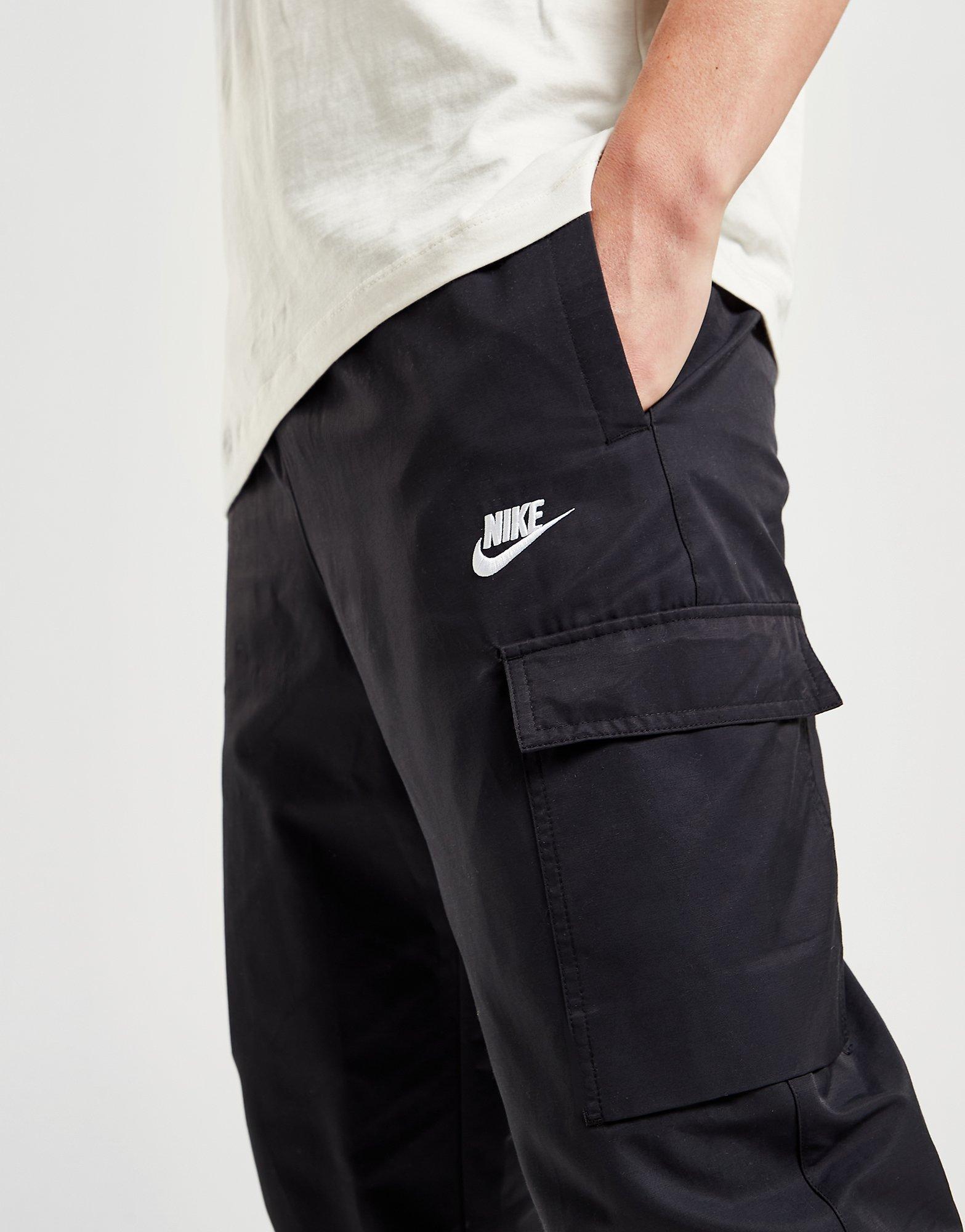 Мъжки панталони NIKE PLAYERS TRACK PANTS DX2033-010 Черен