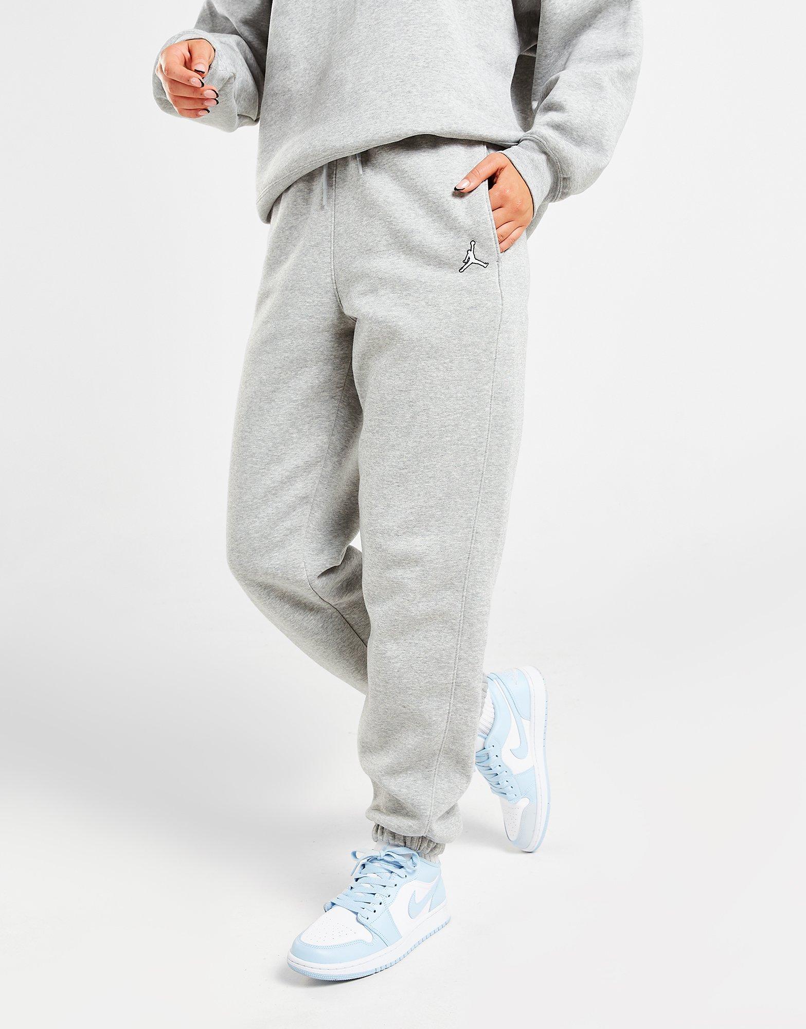 Dámske nohavice JORDAN ESSENTIAL JOGGERS DQ4478-063 Sivá