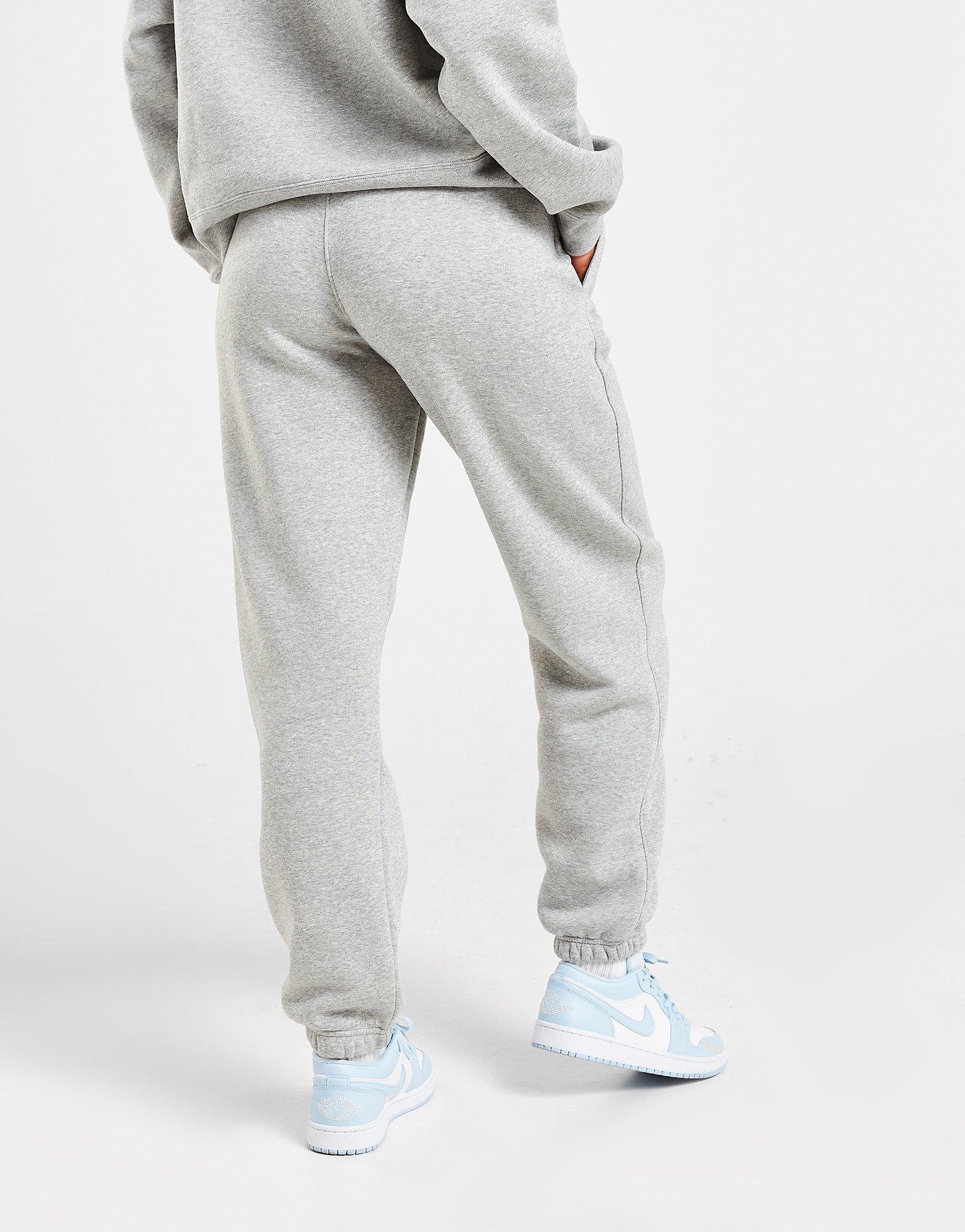Dámske nohavice JORDAN ESSENTIAL JOGGERS DQ4478-063 Sivá