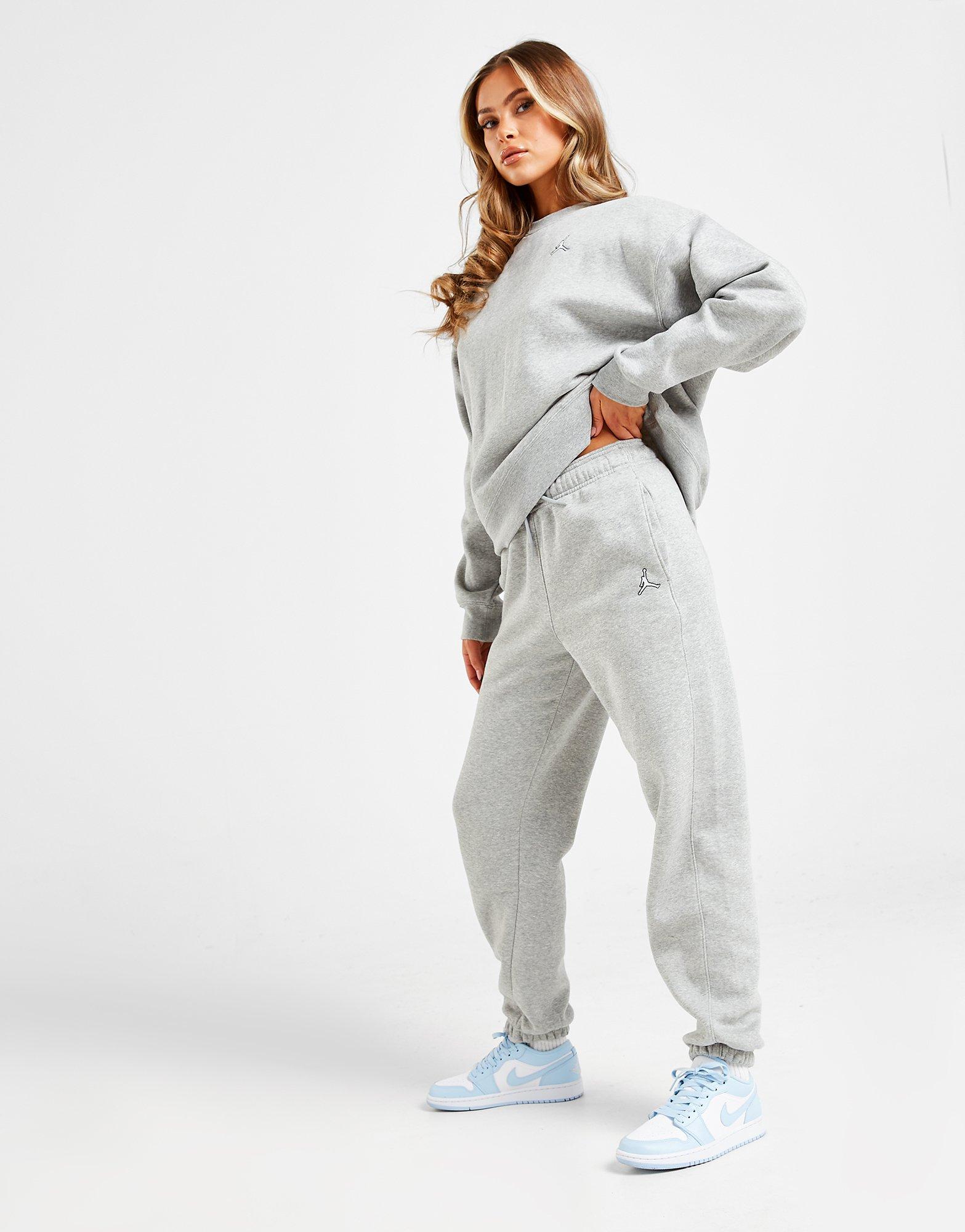 Dámske nohavice JORDAN ESSENTIAL JOGGERS DQ4478-063 Sivá