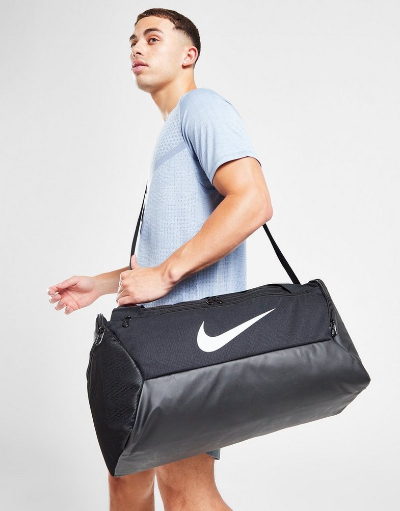 Жіночі сумки і сумочки NIKE СУМКА БЮСТГАЛЬТЕРSILIA SMALL DUFFEL DM3976-010 Чорний