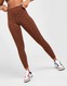 NIKE SPODNIE AIR AOP HR TGT CACAO