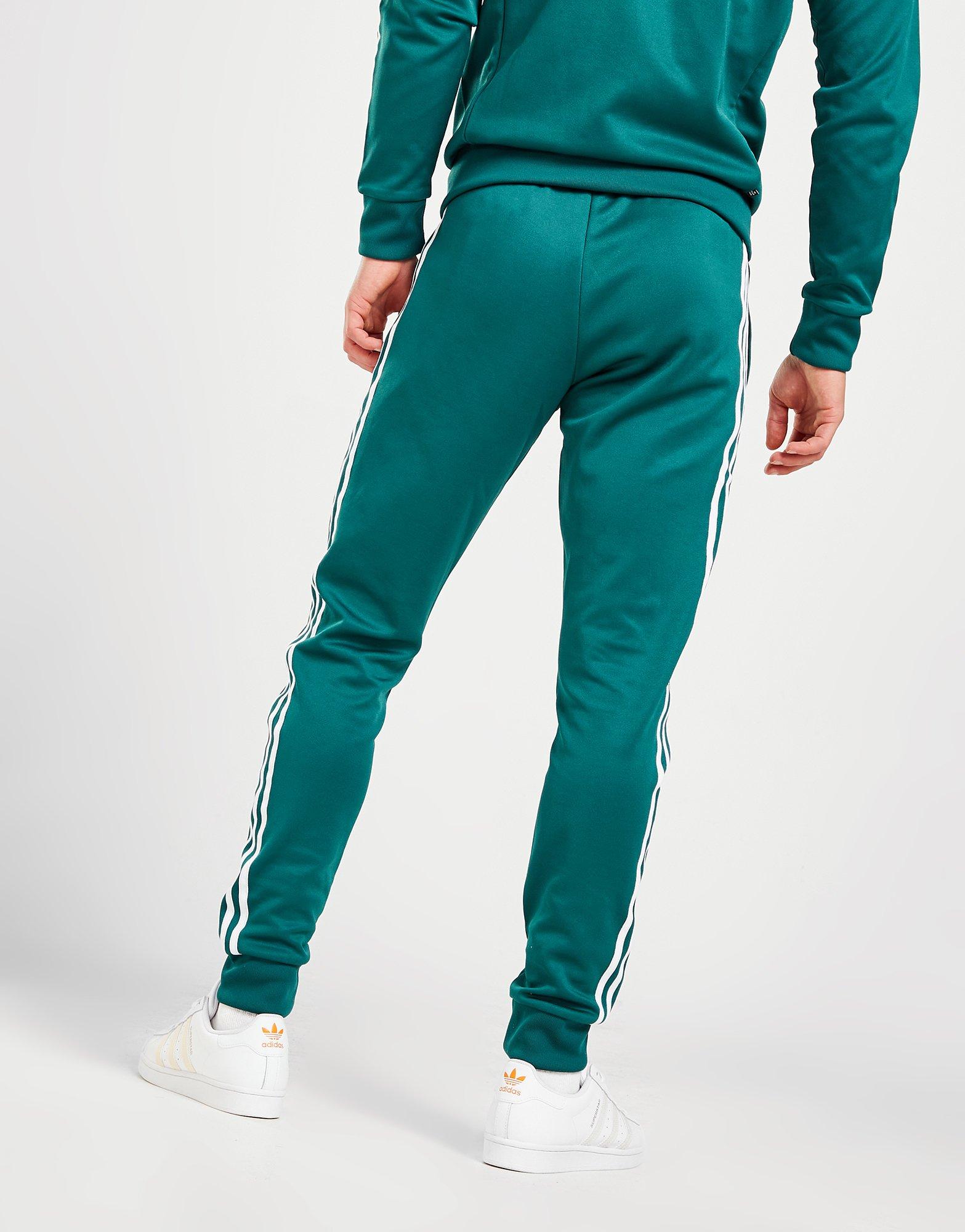 Pánske nohavice ADIDAS SUPERSTAR TRACK PANTS IC4515 Zelená