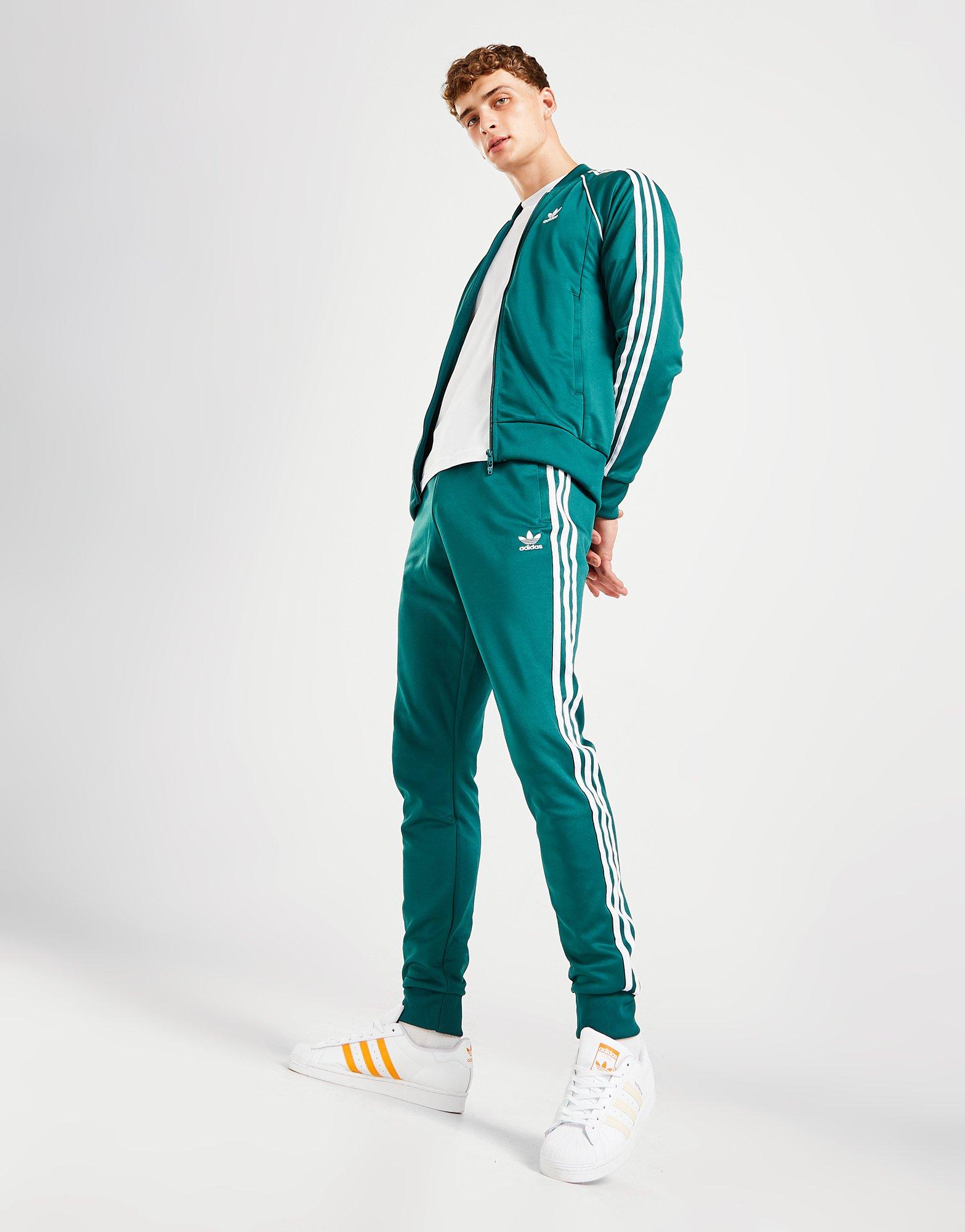Pánske nohavice ADIDAS SUPERSTAR TRACK PANTS IC4515 Zelená