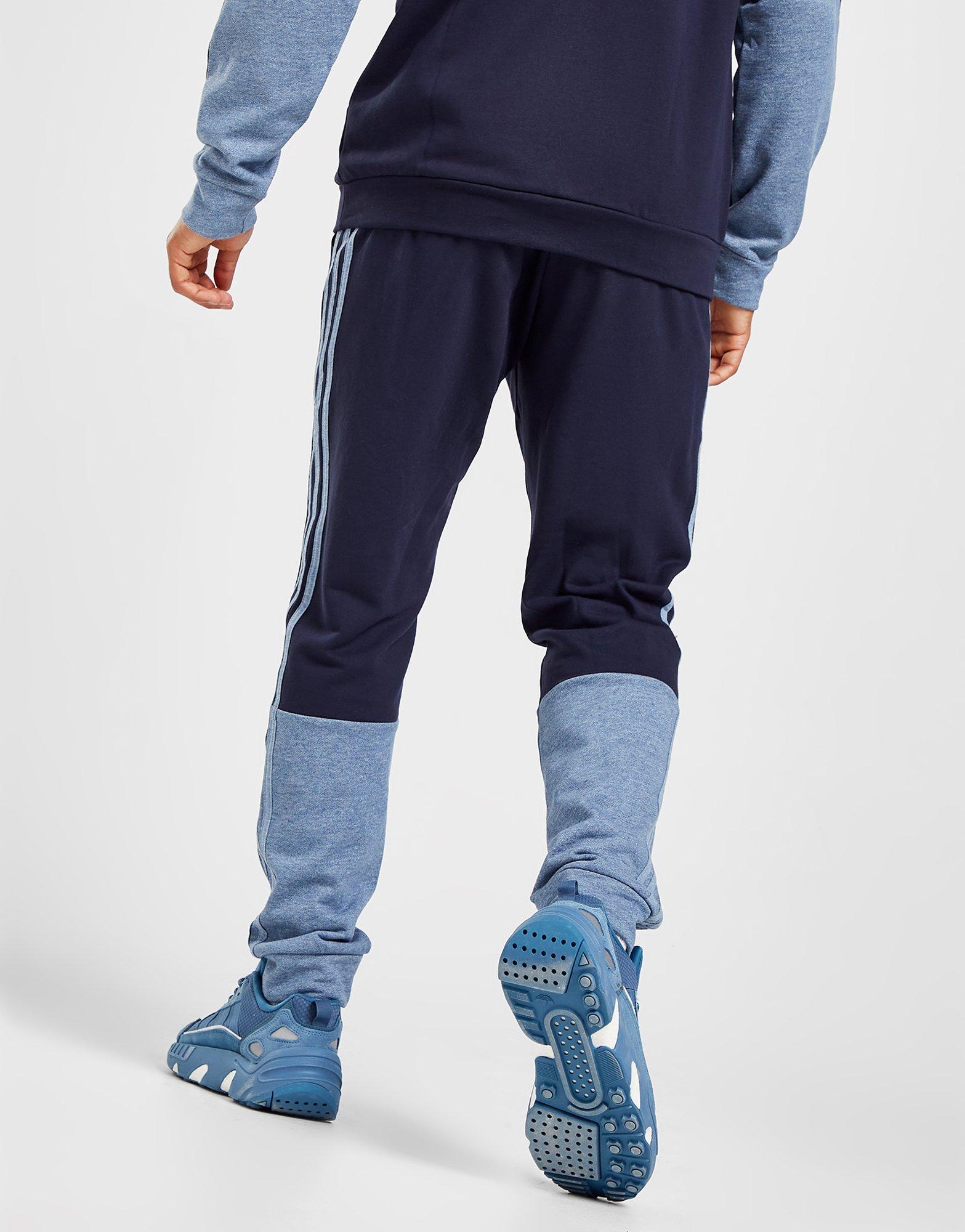 Pánske nohavice ADIDAS BADGE OF SPORT MELANGE JOGGERS HK2898 Tmavomodrá