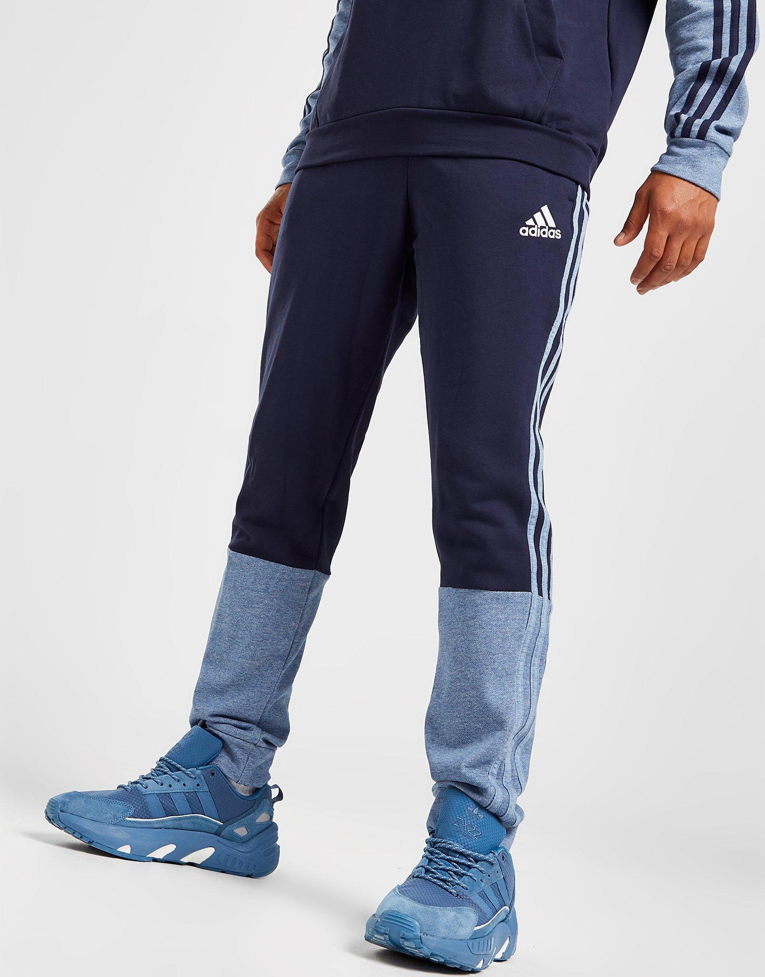 Pánske nohavice ADIDAS BADGE OF SPORT MELANGE JOGGERS HK2898 Tmavomodrá