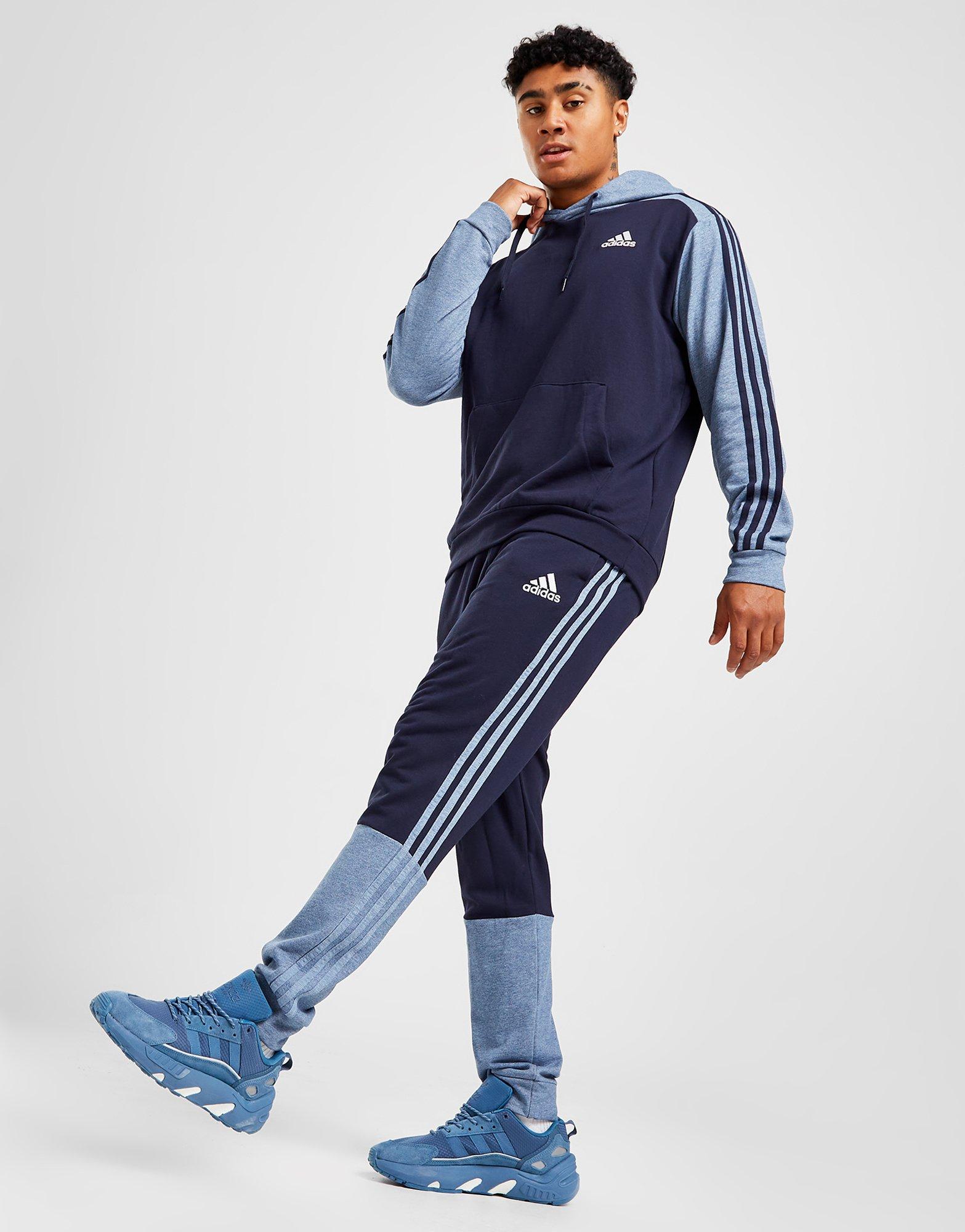 Pánske nohavice ADIDAS BADGE OF SPORT MELANGE JOGGERS HK2898 Tmavomodrá