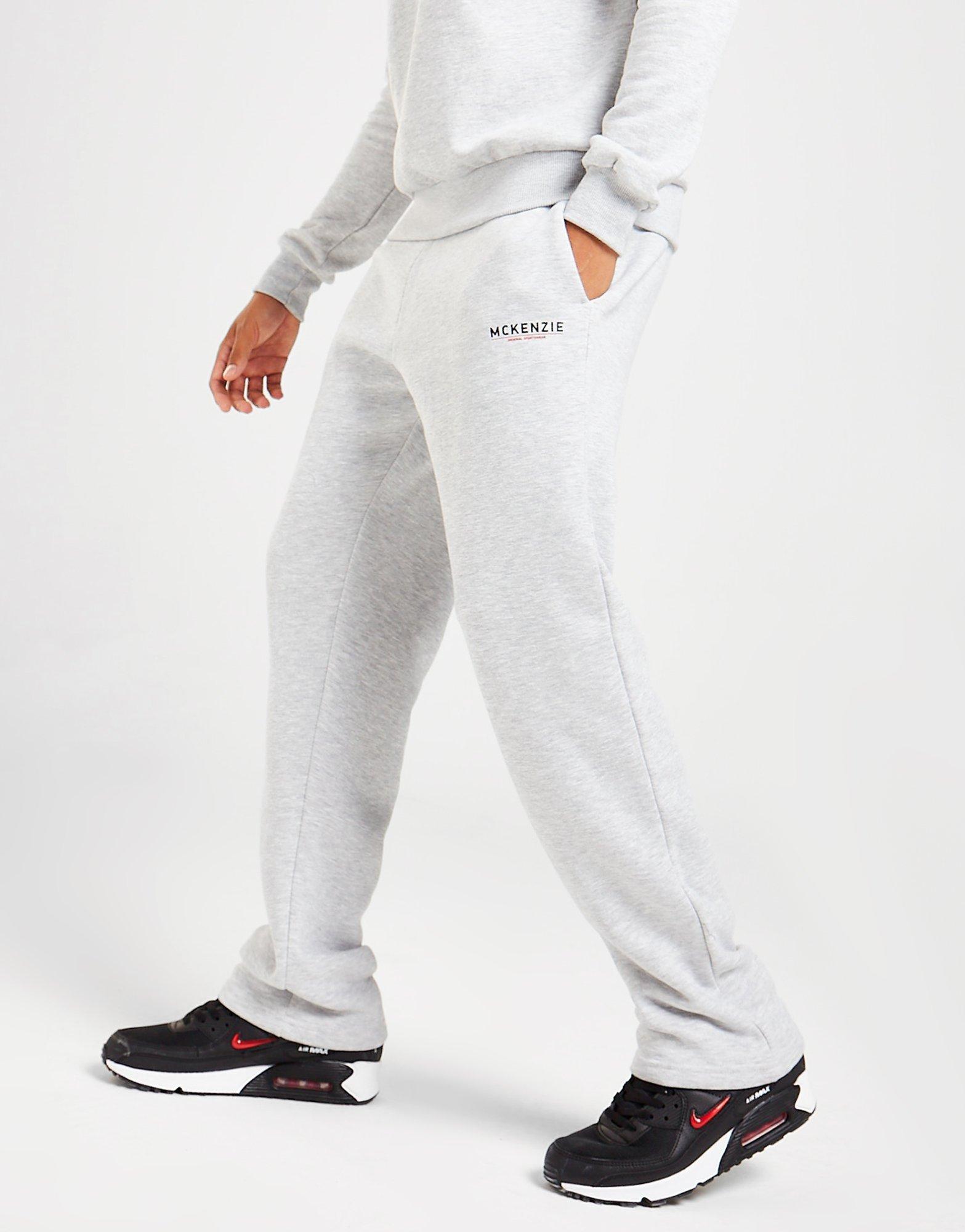 Pánske nohavice MCKENZIE TRENINGOWE ESSENTIAL OPEN HEM JOGGERS MCKTM15345 Sivá