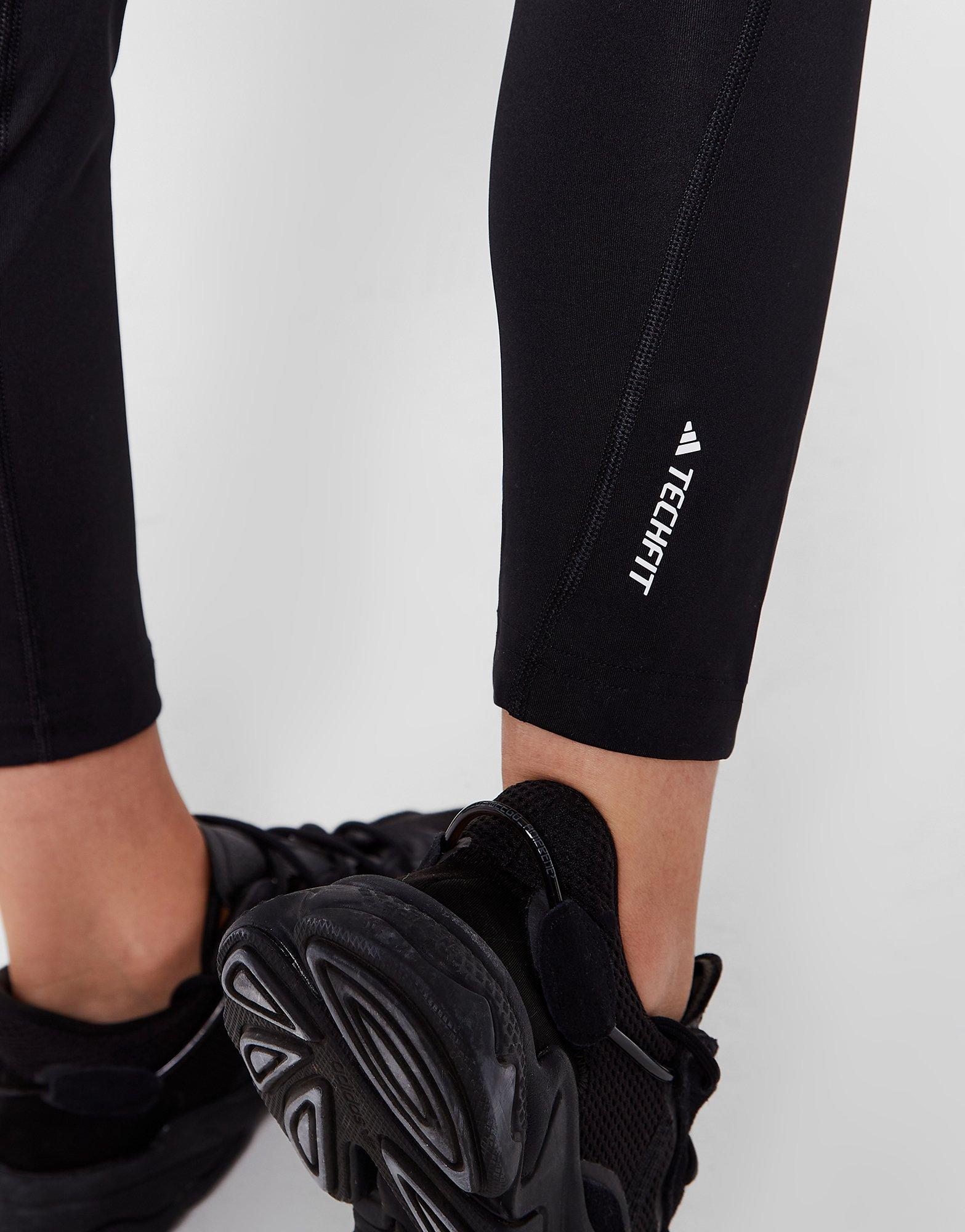 Pantaloni pentru copii ADIDAS PANTALONI  (G)(F) BOS TECHFIT TF TIGHT BLK GIRL HL2446 Negru