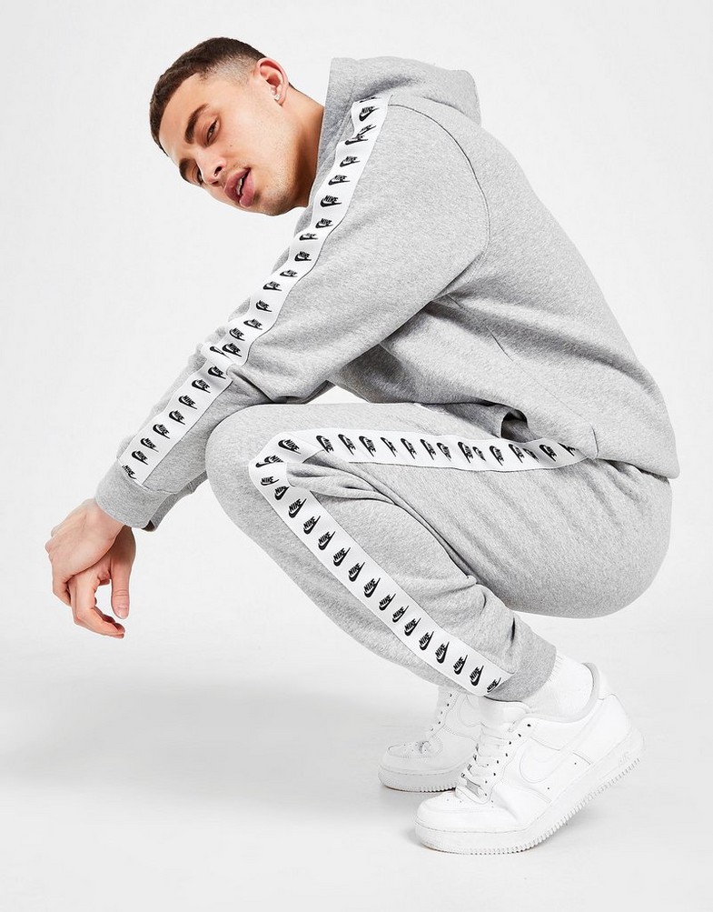 NIKE ZEUS TAPE JOGGERS  DM6838063P Szary