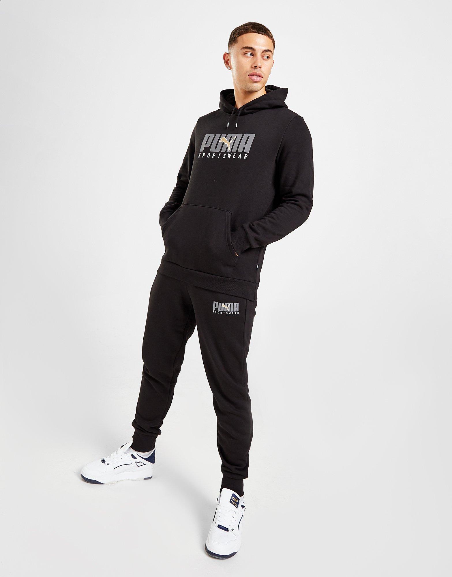 Vyriškos kelnės PUMA KELNĖS CORE SPTSW PANTS BLK/GLD 67488601 Juoda