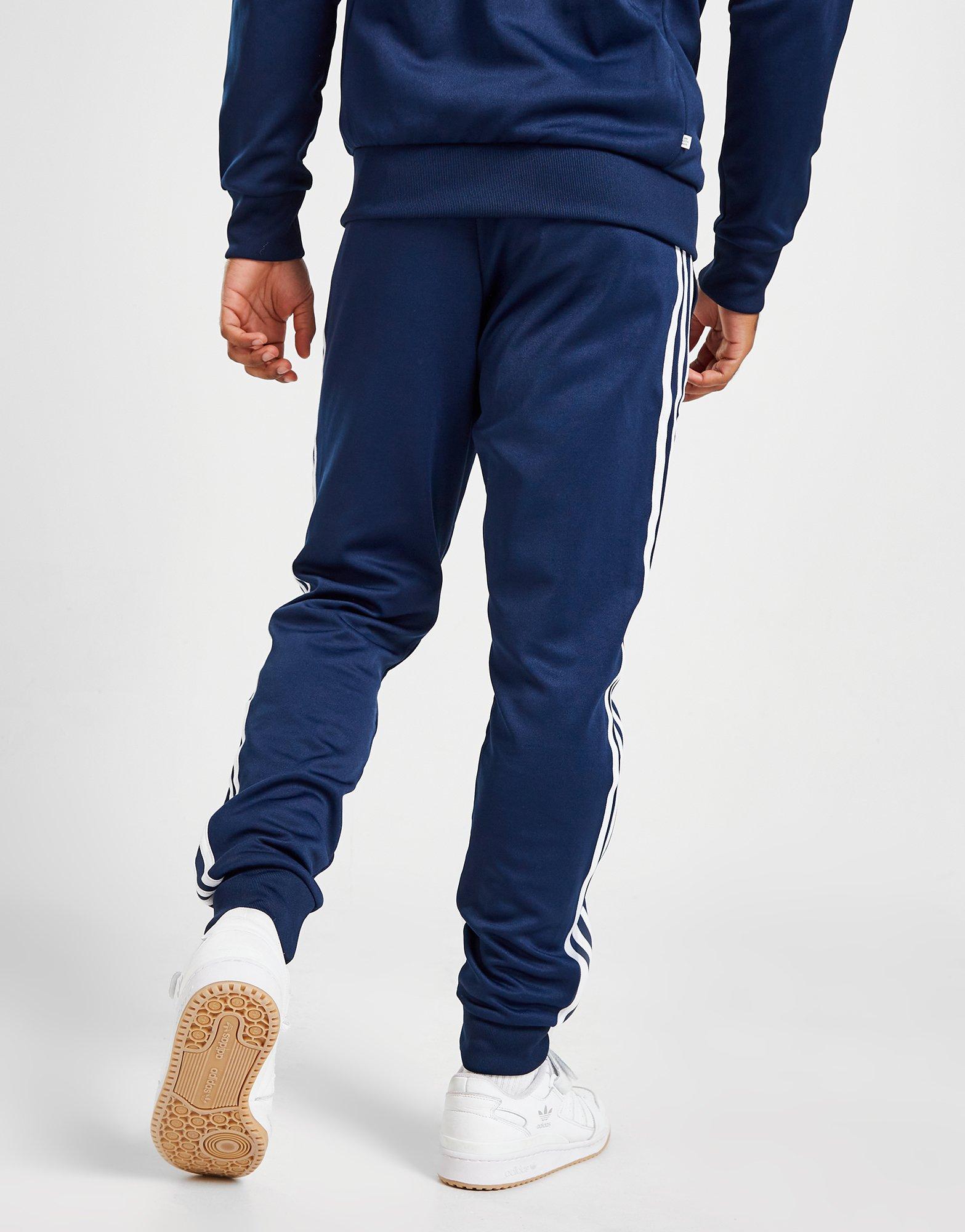 ADIDAS SPODNIE SST TP P BLUE HK7353 Granatowy