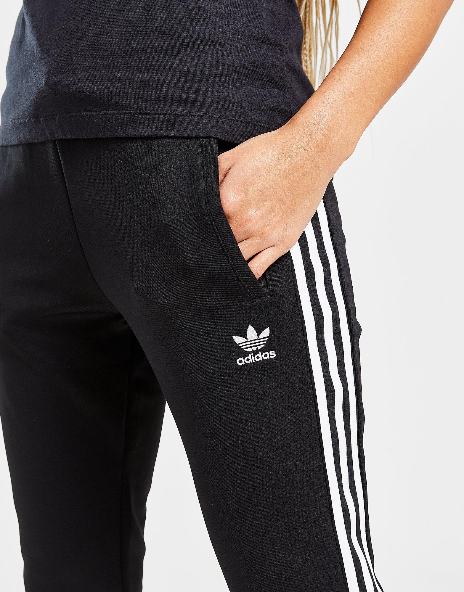 Moteriškos kelnės ADIDAS KELNĖS S'STAR JOG BLK/WHT HZ4131 Juoda