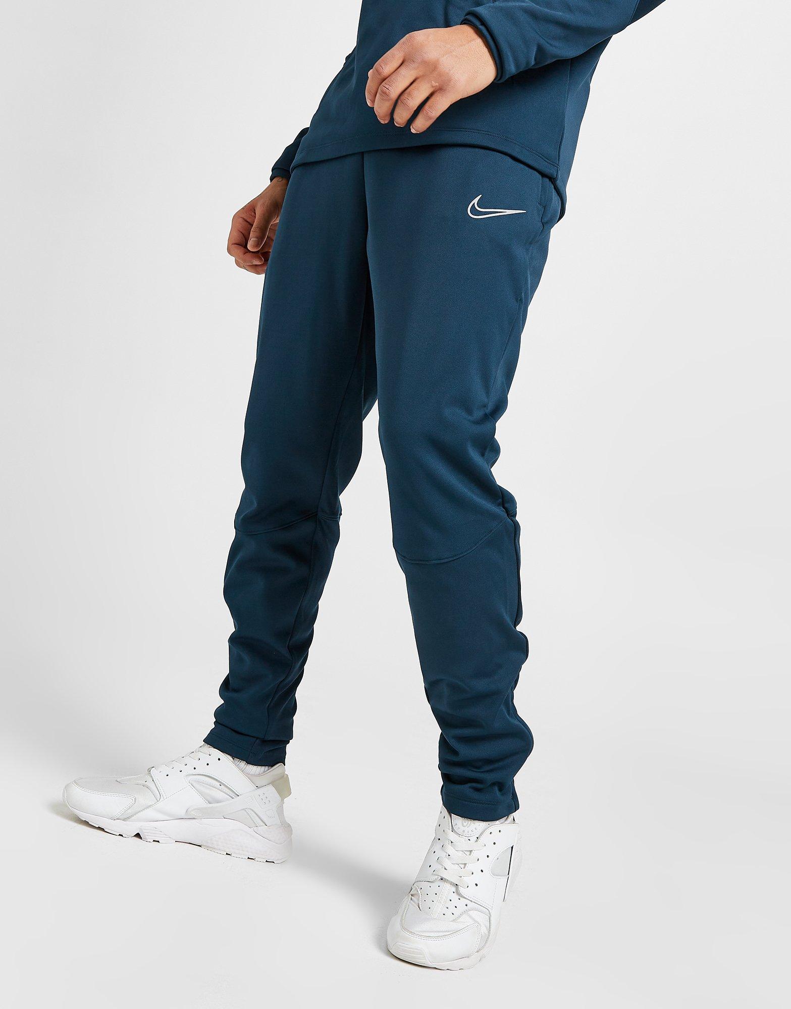 NIKE TRENINGOWE ACADEMY WINTER WARRIOR TRACK PANTS DC9142-454 Granatowy