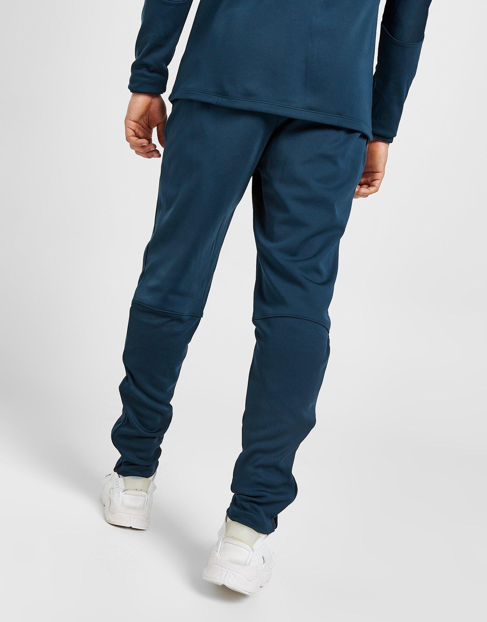 NIKE TRENINGOWE ACADEMY WINTER WARRIOR TRACK PANTS DC9142-454 Granatowy