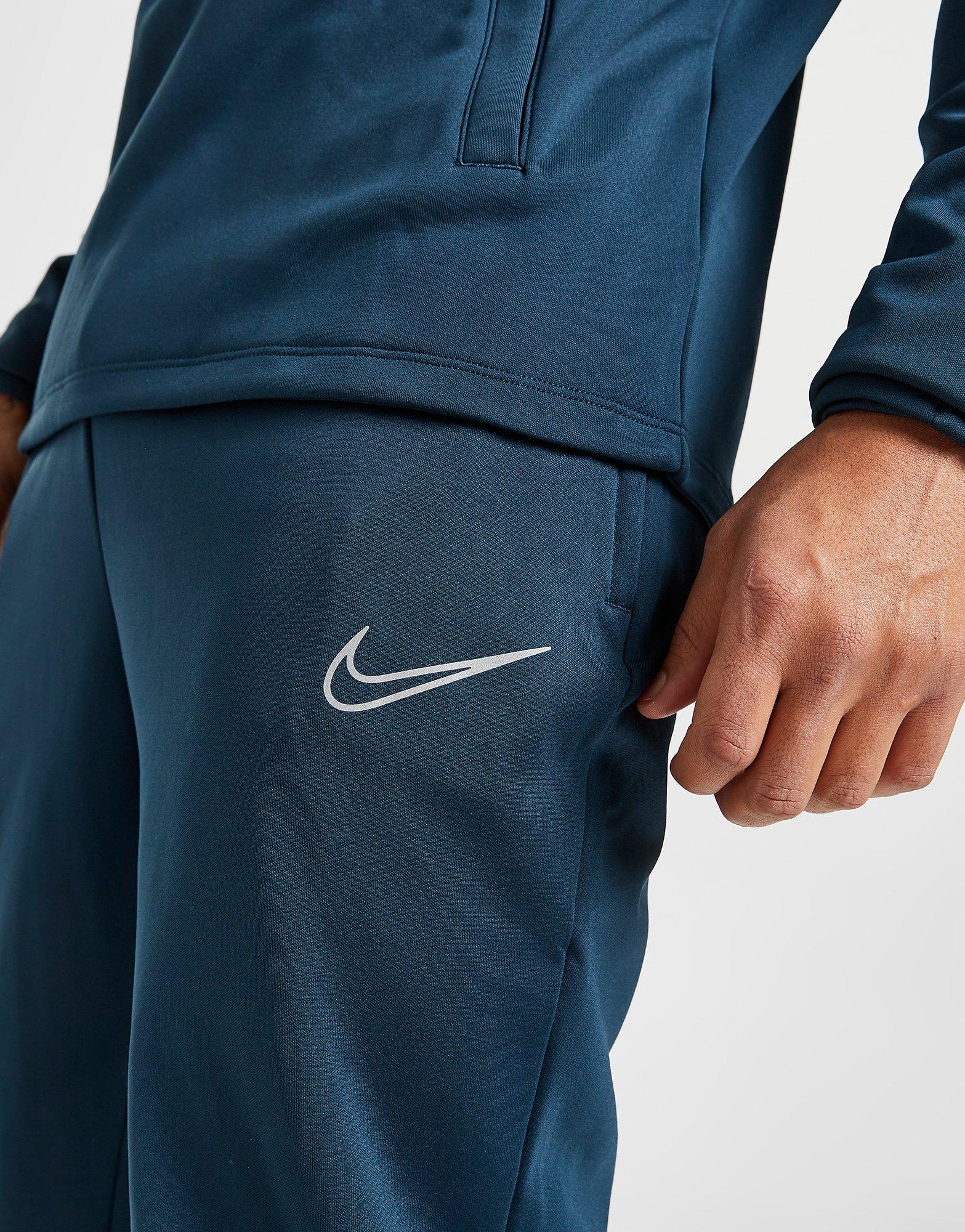 NIKE TRENINGOWE ACADEMY WINTER WARRIOR TRACK PANTS DC9142-454 Granatowy