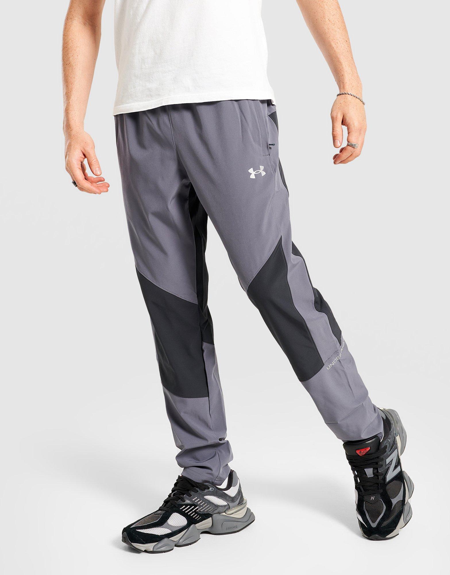 Мъжко фитнес облекло UNDER ARMOUR ПАНТАЛОНИ TECH HYBRID WVN PANTS 6007952-016 Сив