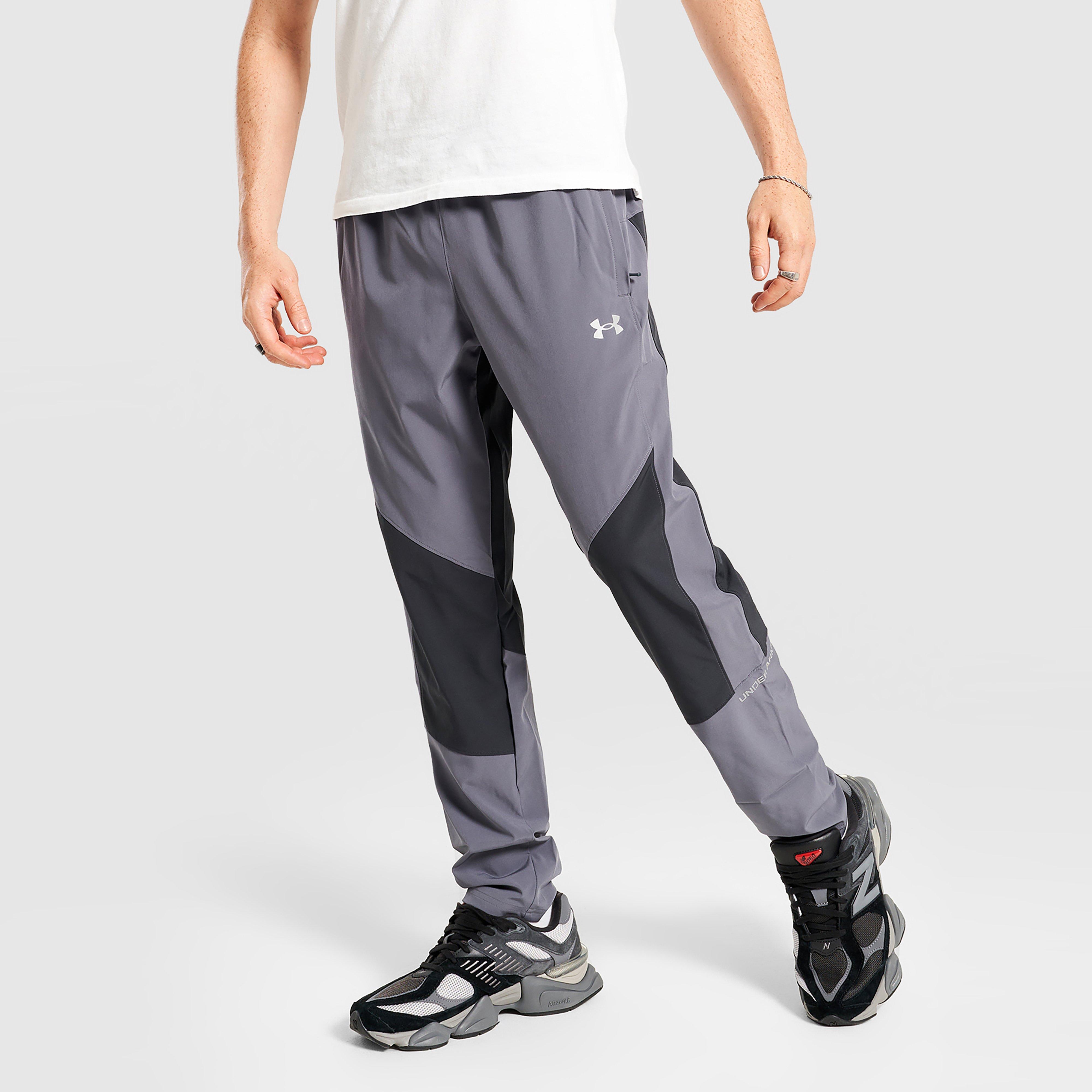 Férfi melegítőnadrág és jogger UNDER ARMOUR NADRÁG TECH HYBRID WVN PANTS