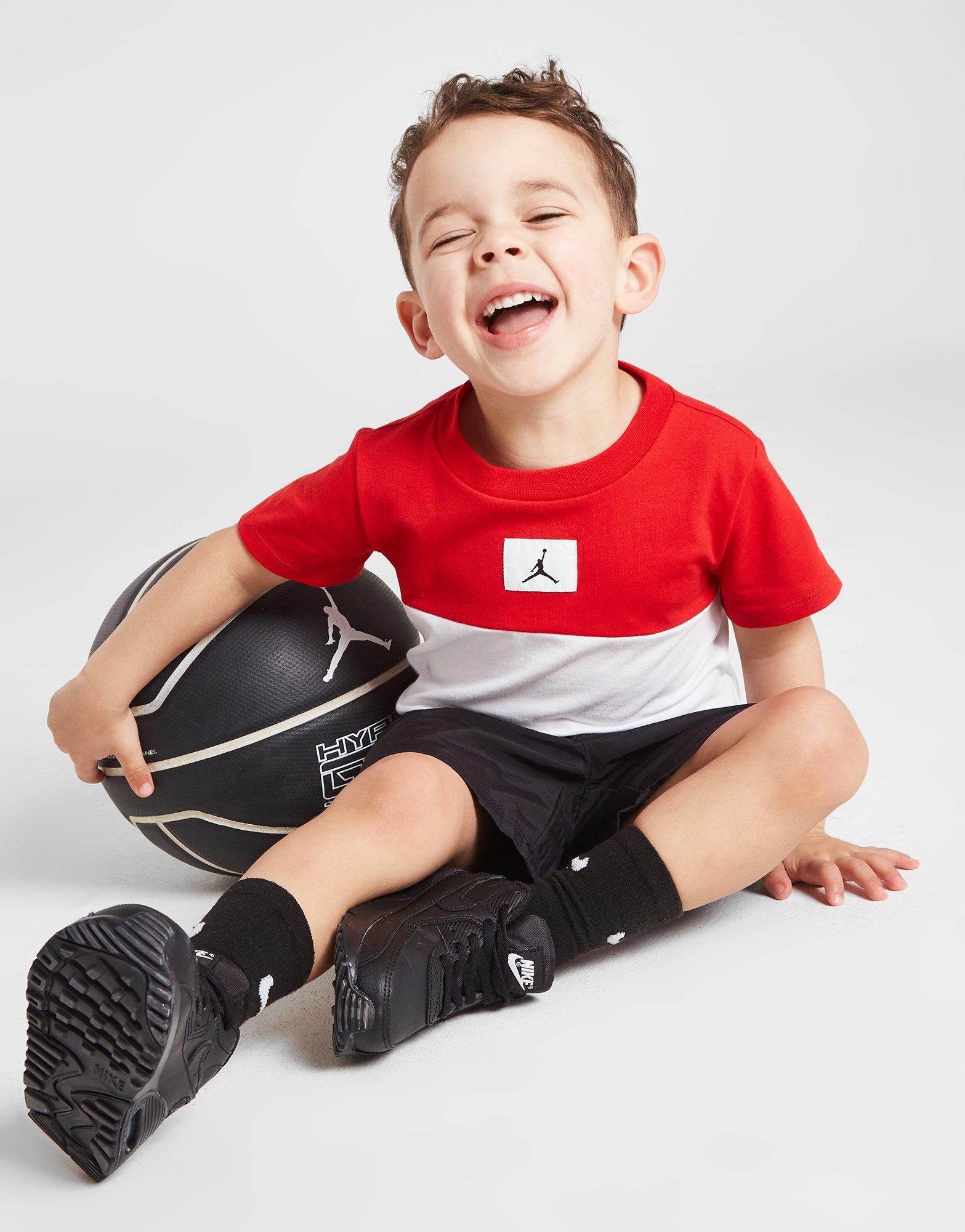 Komplet dresowy dziecięcy JORDAN KOMPLET C/BLK WVN T/SHRT ST RED/BLK 55C320-023 Czarny