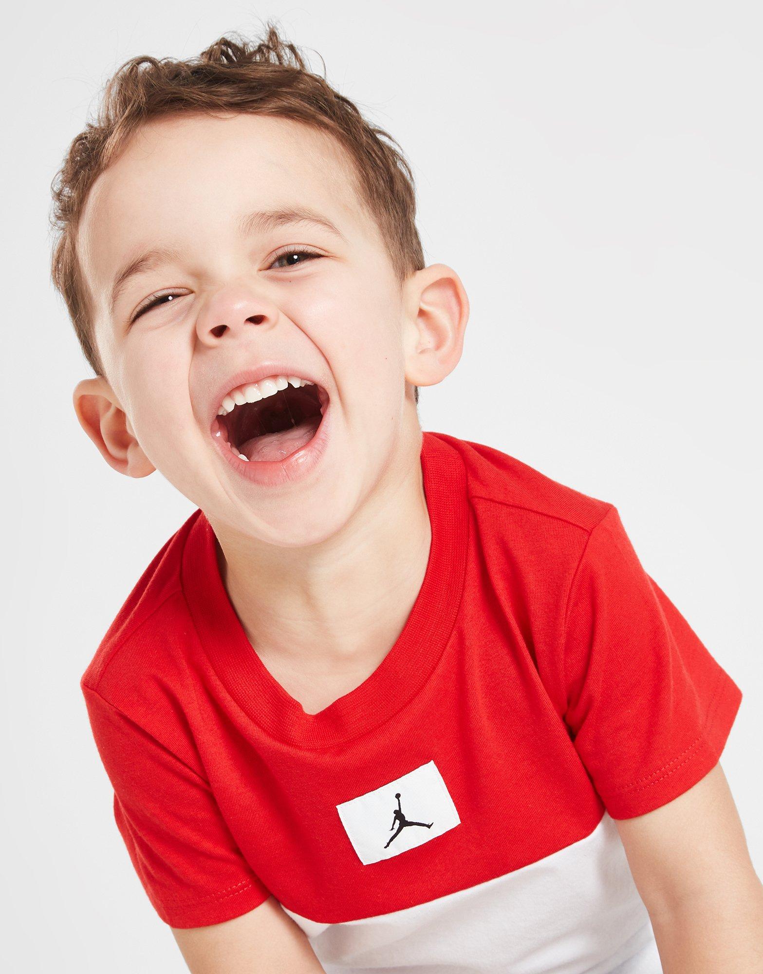 Komplet dresowy dziecięcy JORDAN KOMPLET C/BLK WVN T/SHRT ST RED/BLK 55C320-023 Czarny