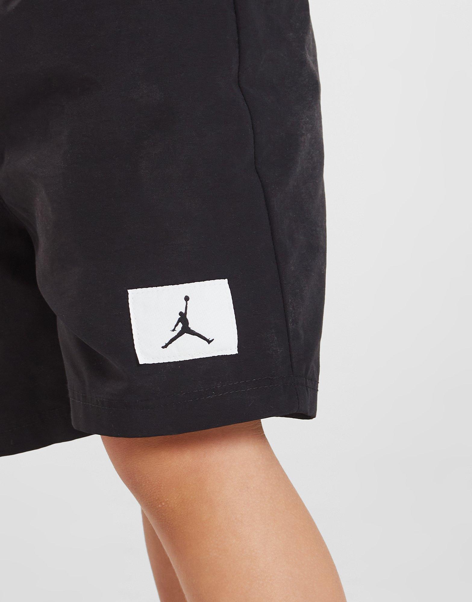 Komplet dresowy dziecięcy JORDAN KOMPLET C/BLK WVN T/SHRT ST RED/BLK 55C320-023 Czarny