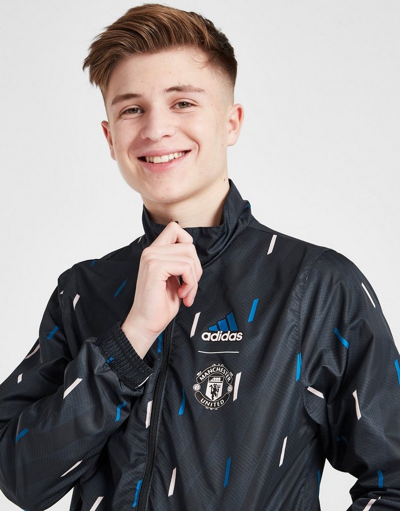 Koszulka, t-shirt dziecięcy ADIDAS KRÓTKI RĘKAW MANCHESTER UNITED FC ANTHEM JACKET JUNIOR HT1996 Czarny