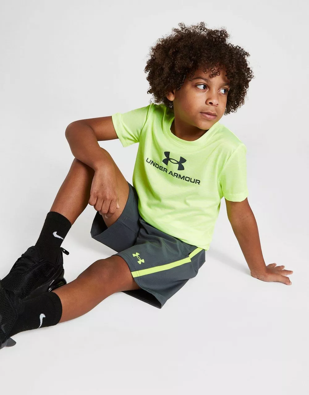 Under Armour UA CENTRIC BRAN TECH TWST T/WVN ST LM/GY, фото 1 з 5