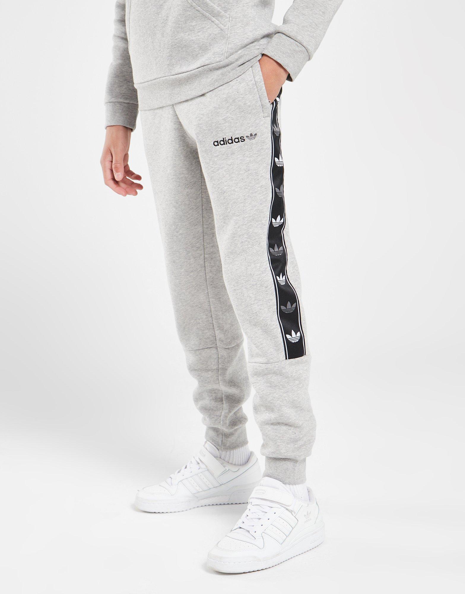 Dětské kalhoty ADIDAS KALHOTY  TAPE FLC PANT MGH PANTS IB3345 Šedá