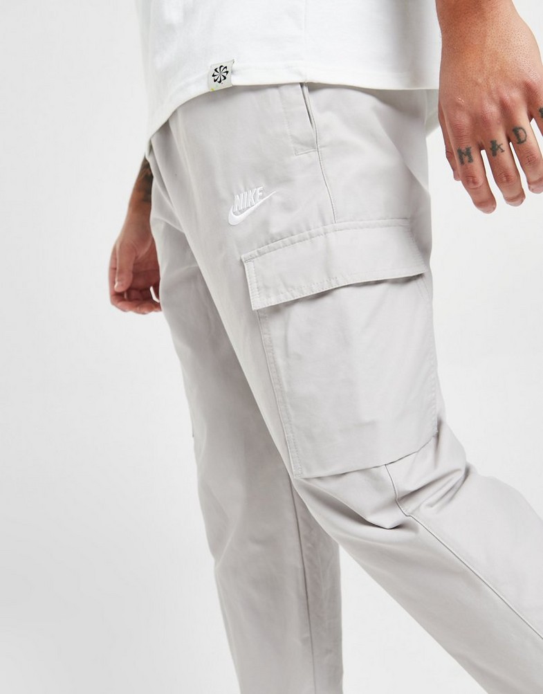 NIKE SPODNIE PLAYER WVN PANT LT ORE PANTS DX2033-012 Beżowy