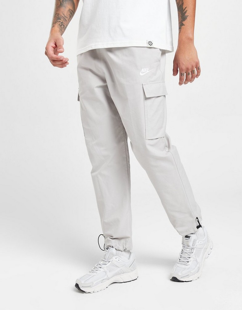 NIKE SPODNIE PLAYER WVN PANT LT ORE PANTS DX2033-012 Beżowy
