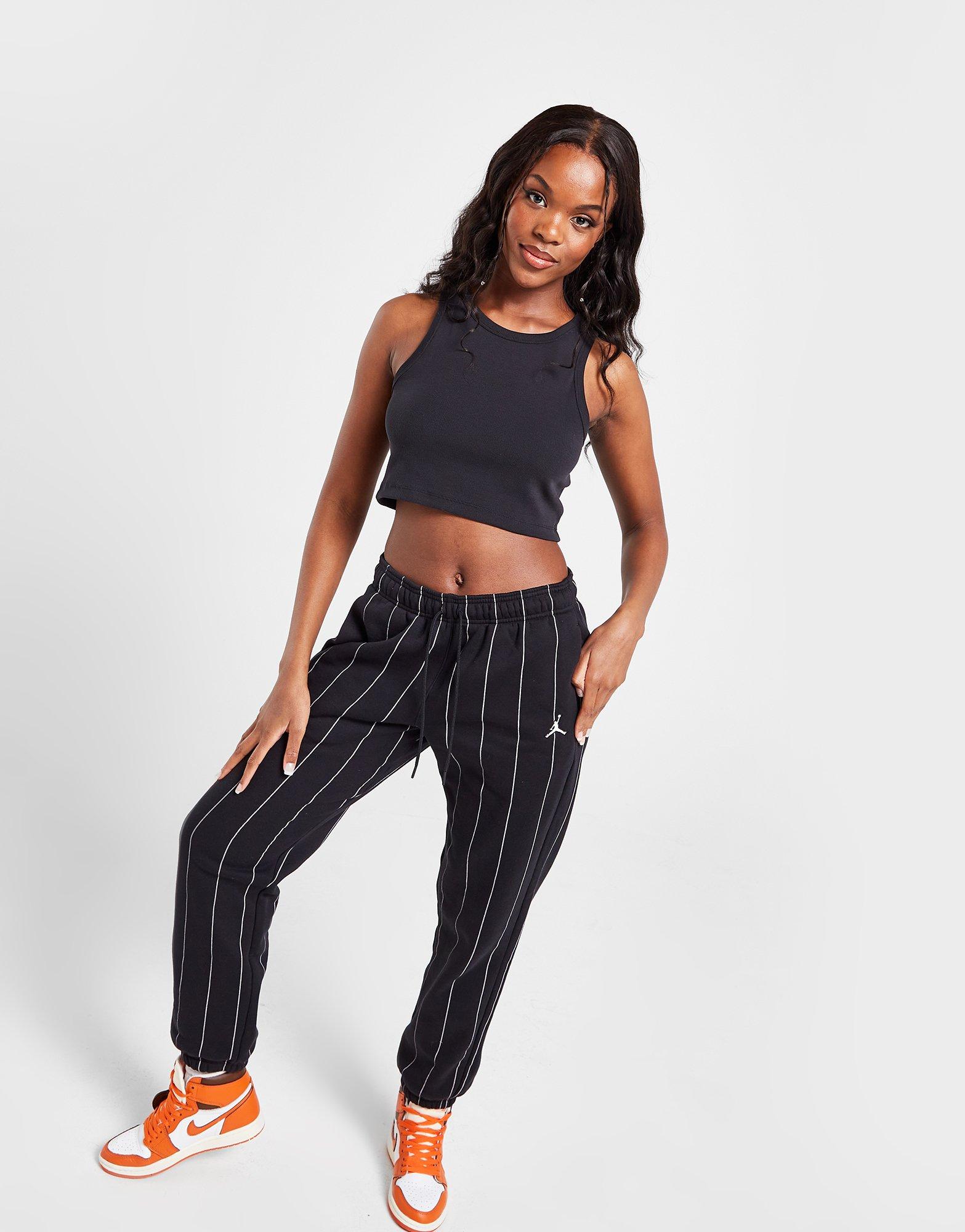 Дамска тениска JORDAN ТЕНИСКА JDN FLT ПОТНИК BLK TEE DX4700-010 Черен