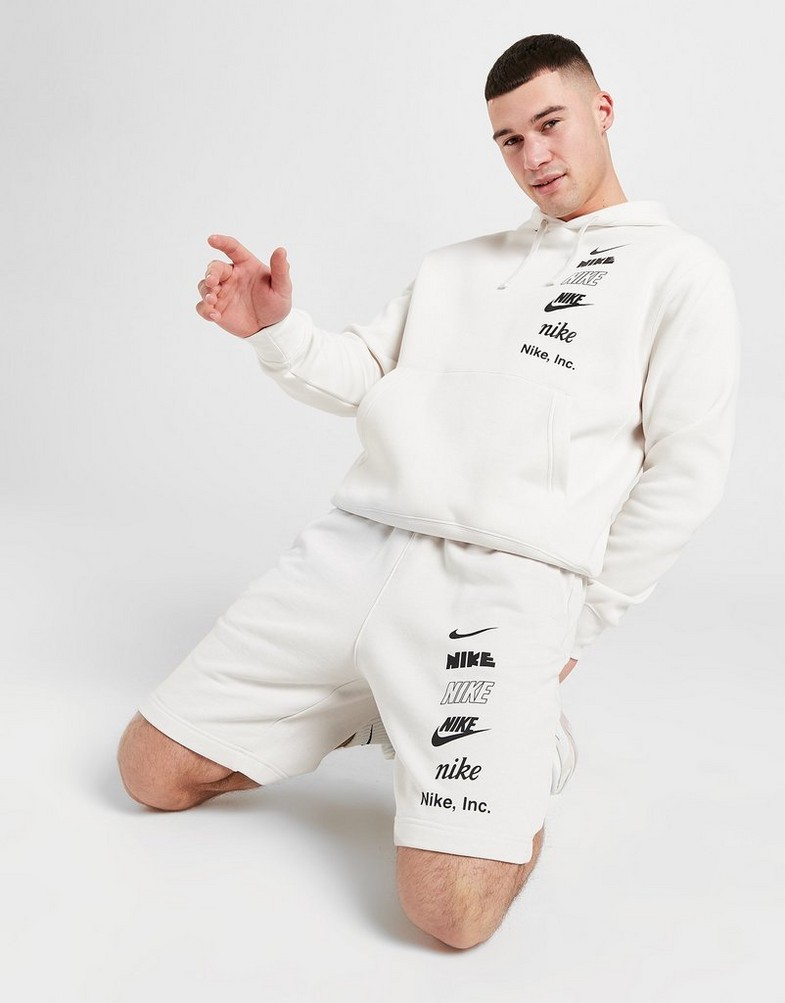 Krótkie spodenki, szorty męskie NIKE SZORTY M NK + FT SHORT MLOGO SHORTS FB8830-030 Beżowy