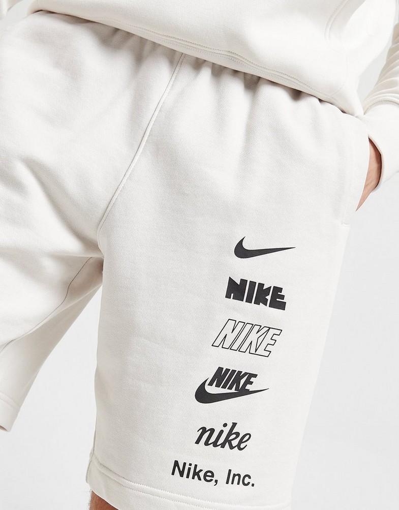 Krótkie spodenki, szorty męskie NIKE SZORTY M NK + FT SHORT MLOGO SHORTS FB8830-030 Beżowy