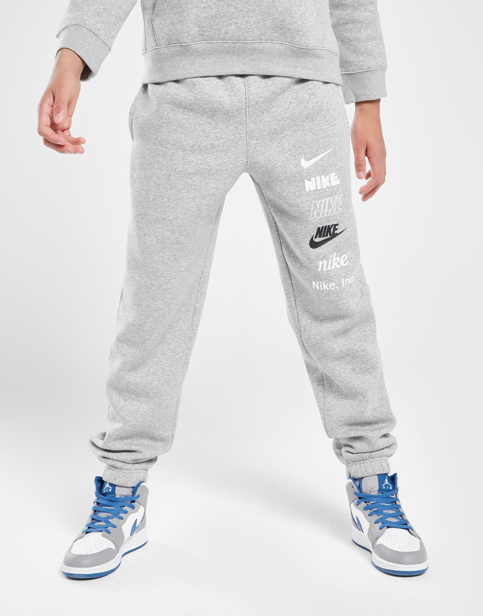Vaikiškos kelnės NIKE KELNĖS MLOGO FLC PNT DGH PANTS DX5160-063 Pilka