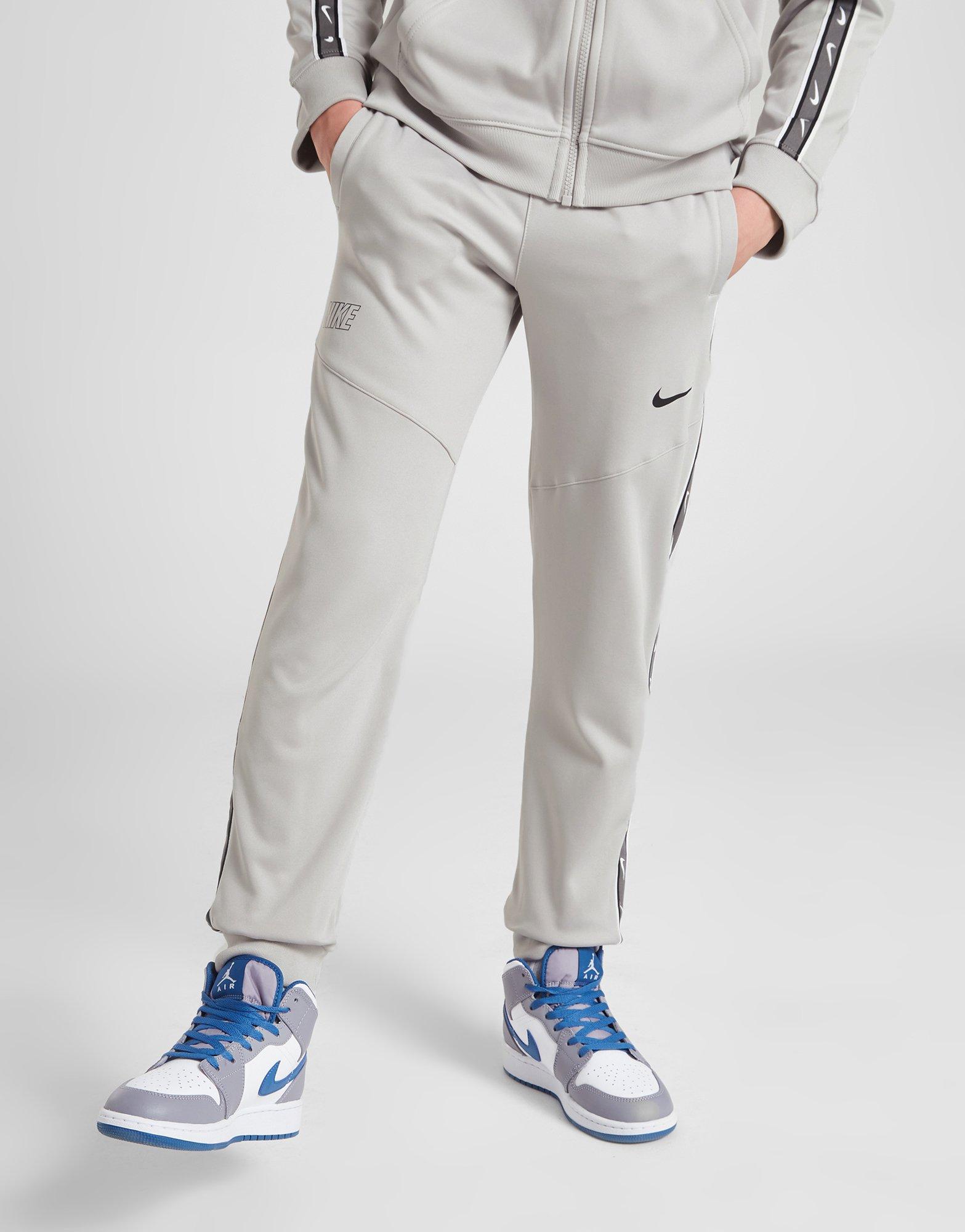 Vaikiškos kelnės NIKE KELNĖS B NSW REPEAT SW PK JOGGER B DZ5623-012 Pilka