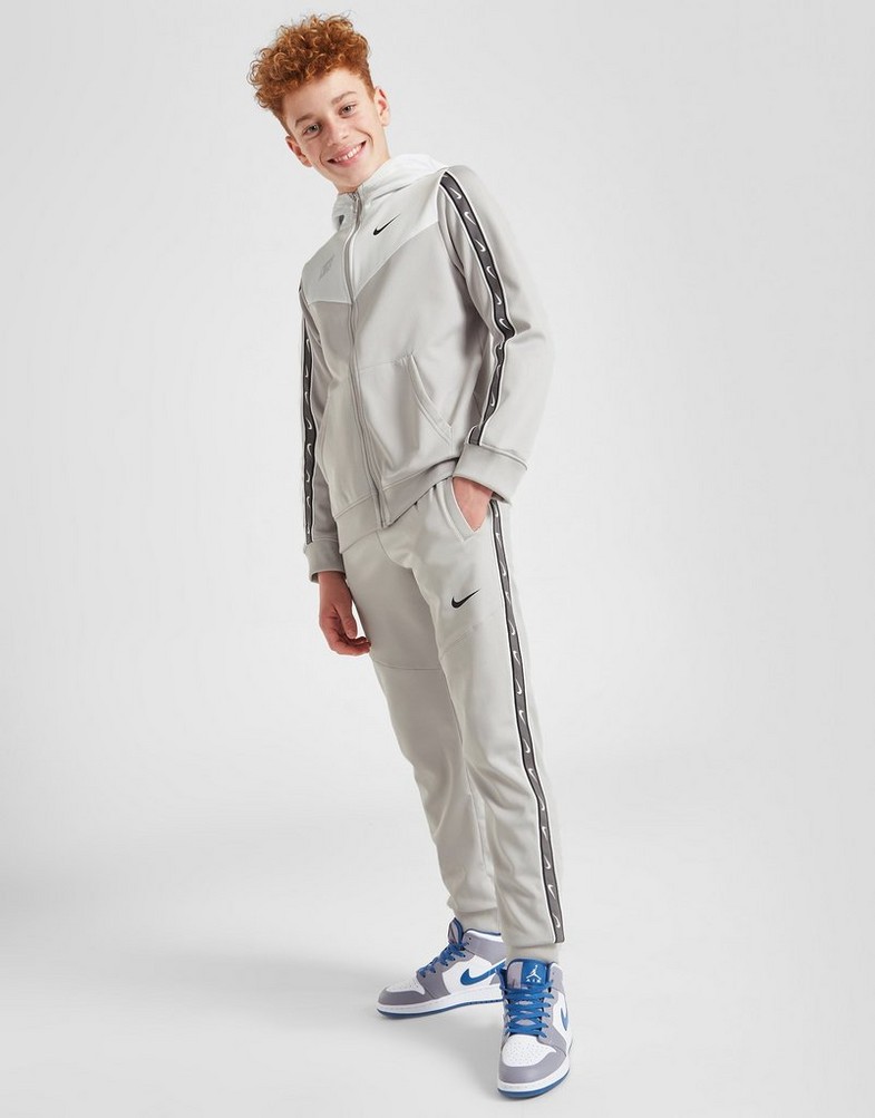 Дитячі штани NIKE ШТАНИ B NSW REPEAT SW PK JOGGER B DZ5623-012 Сірий